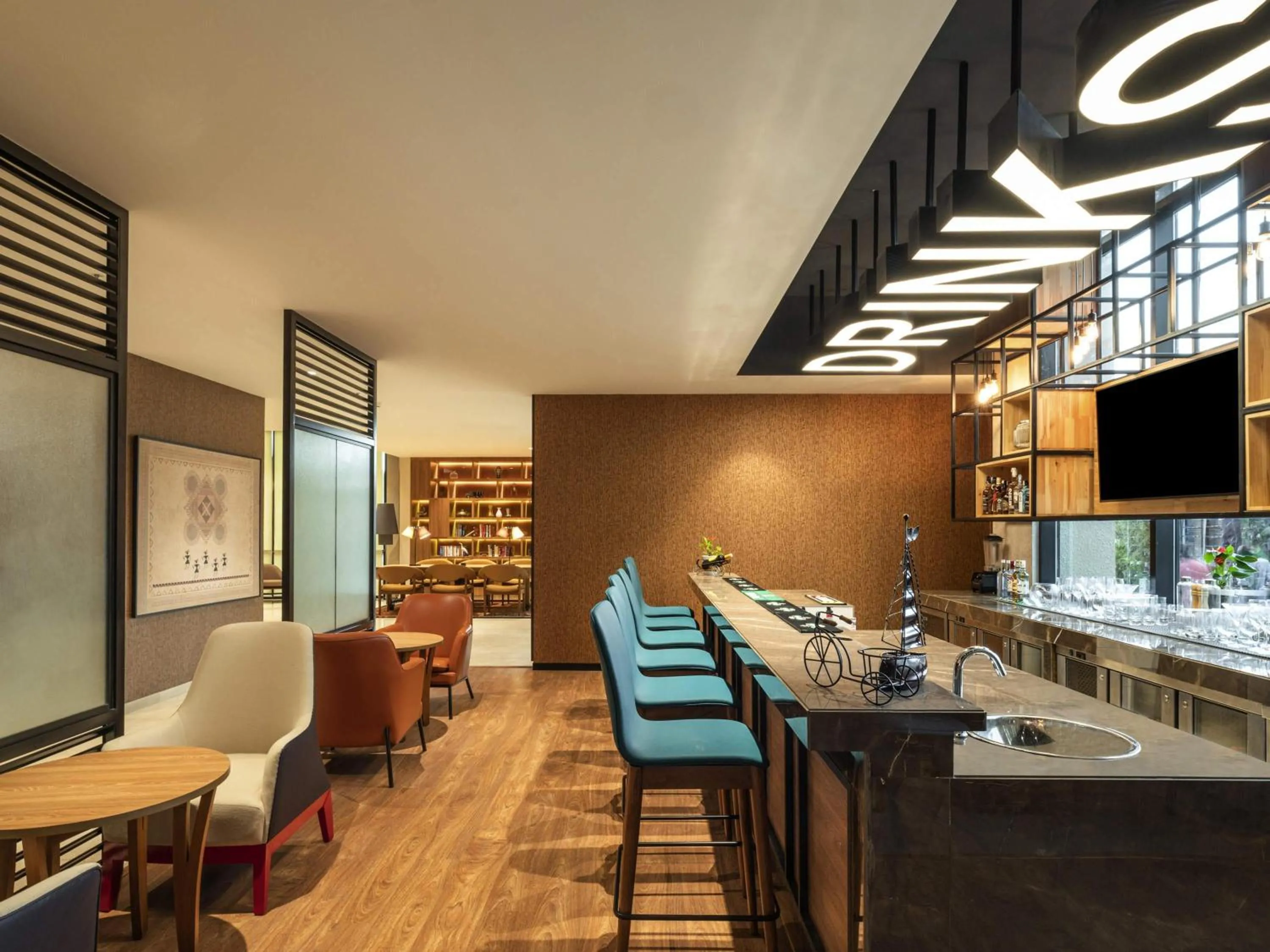 Lounge or bar in ibis Bengaluru Hebbal - An Accor Brand