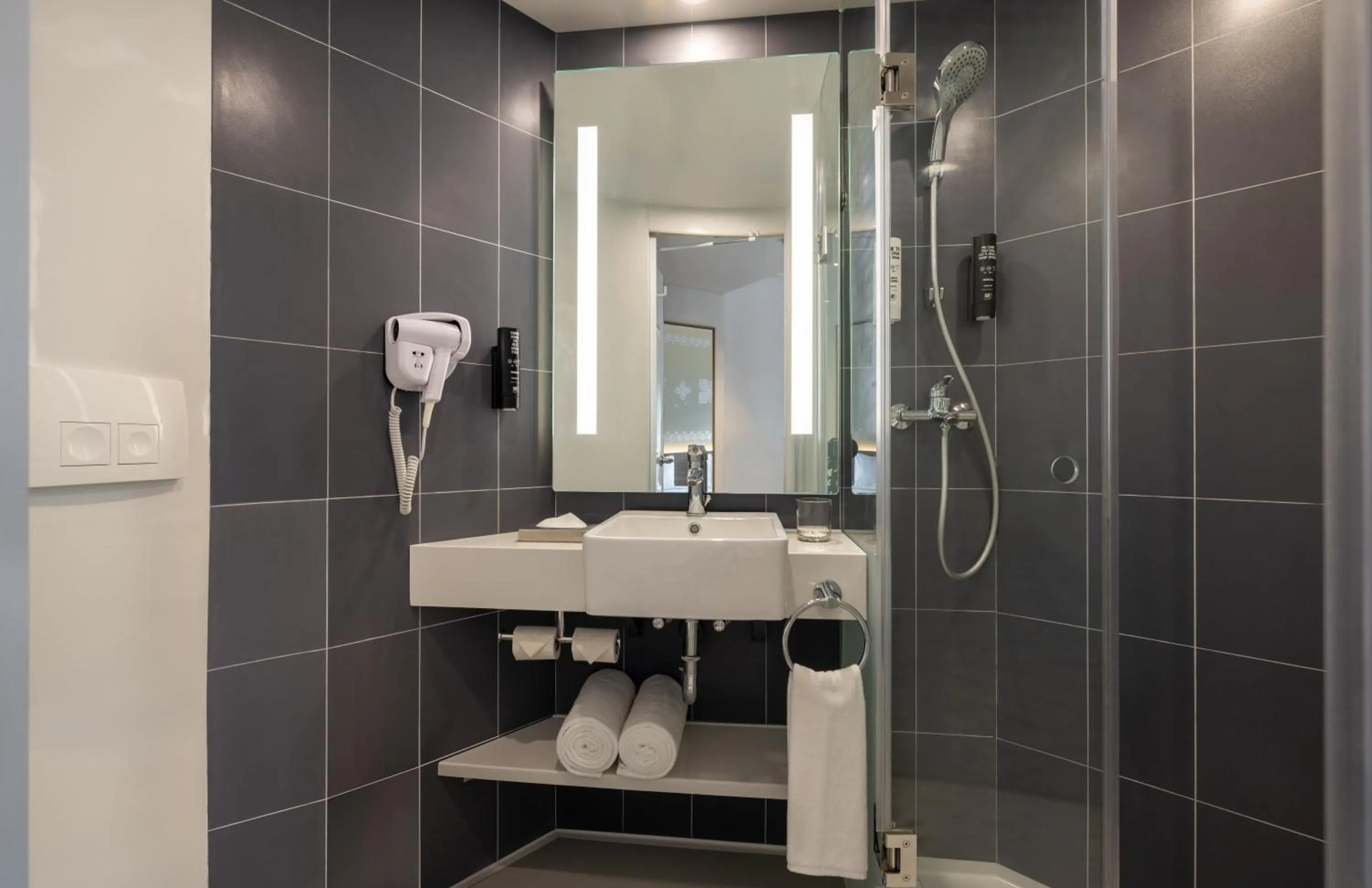 Bathroom in ibis Bengaluru Hebbal - An Accor Brand