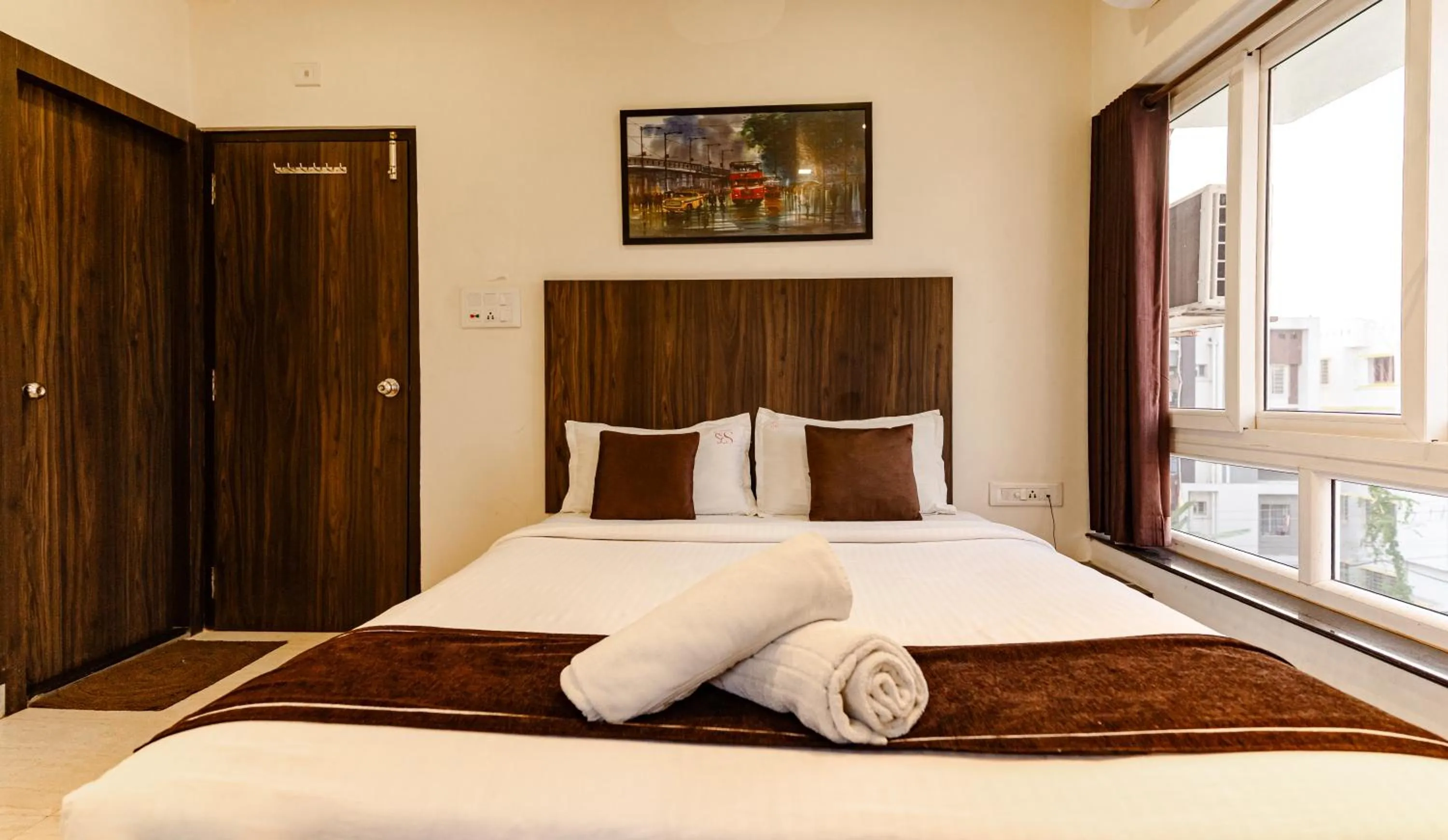 Bed in Sheldon Inn Kolkata