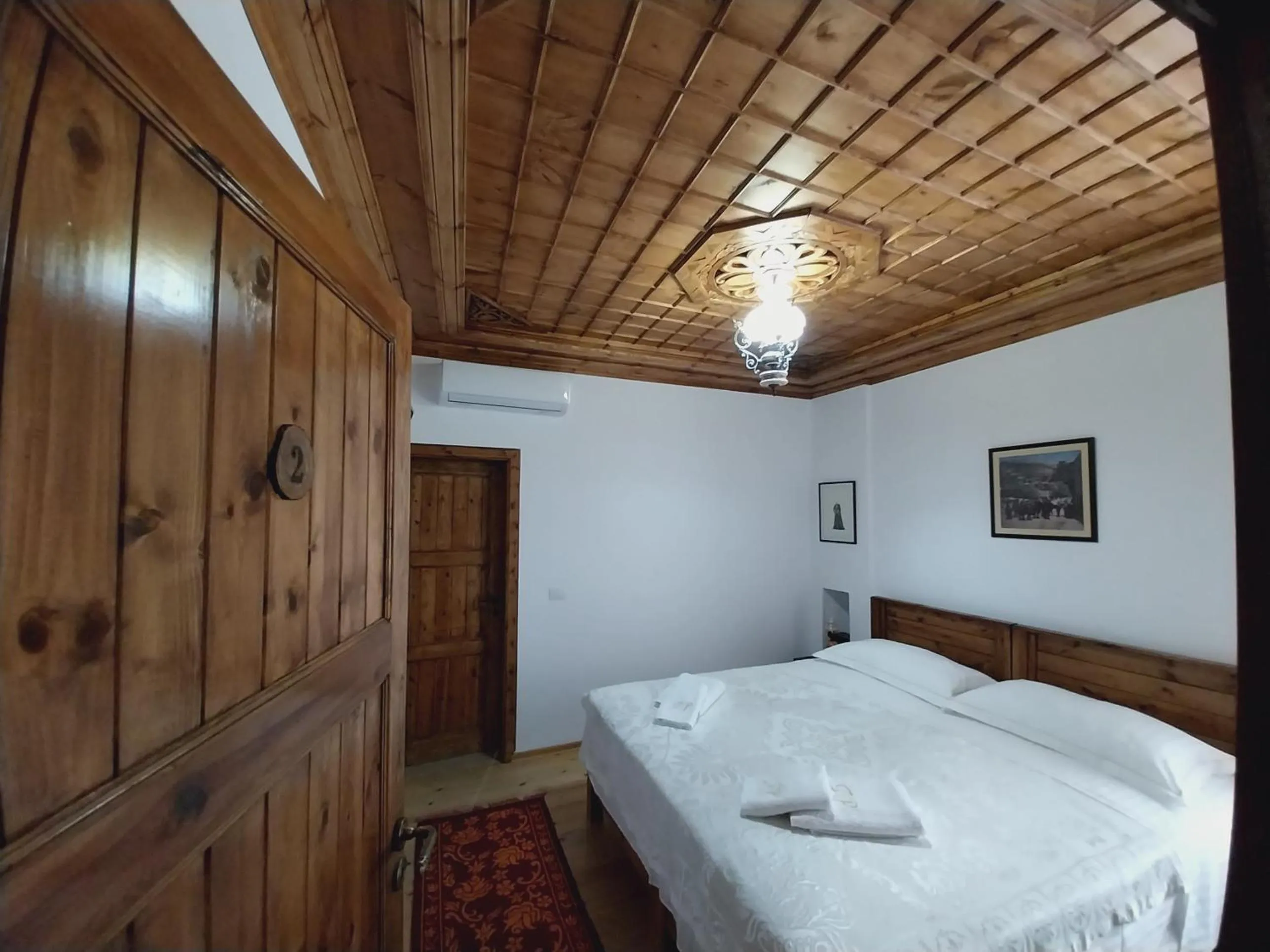Bed in Guest House J.Prifti