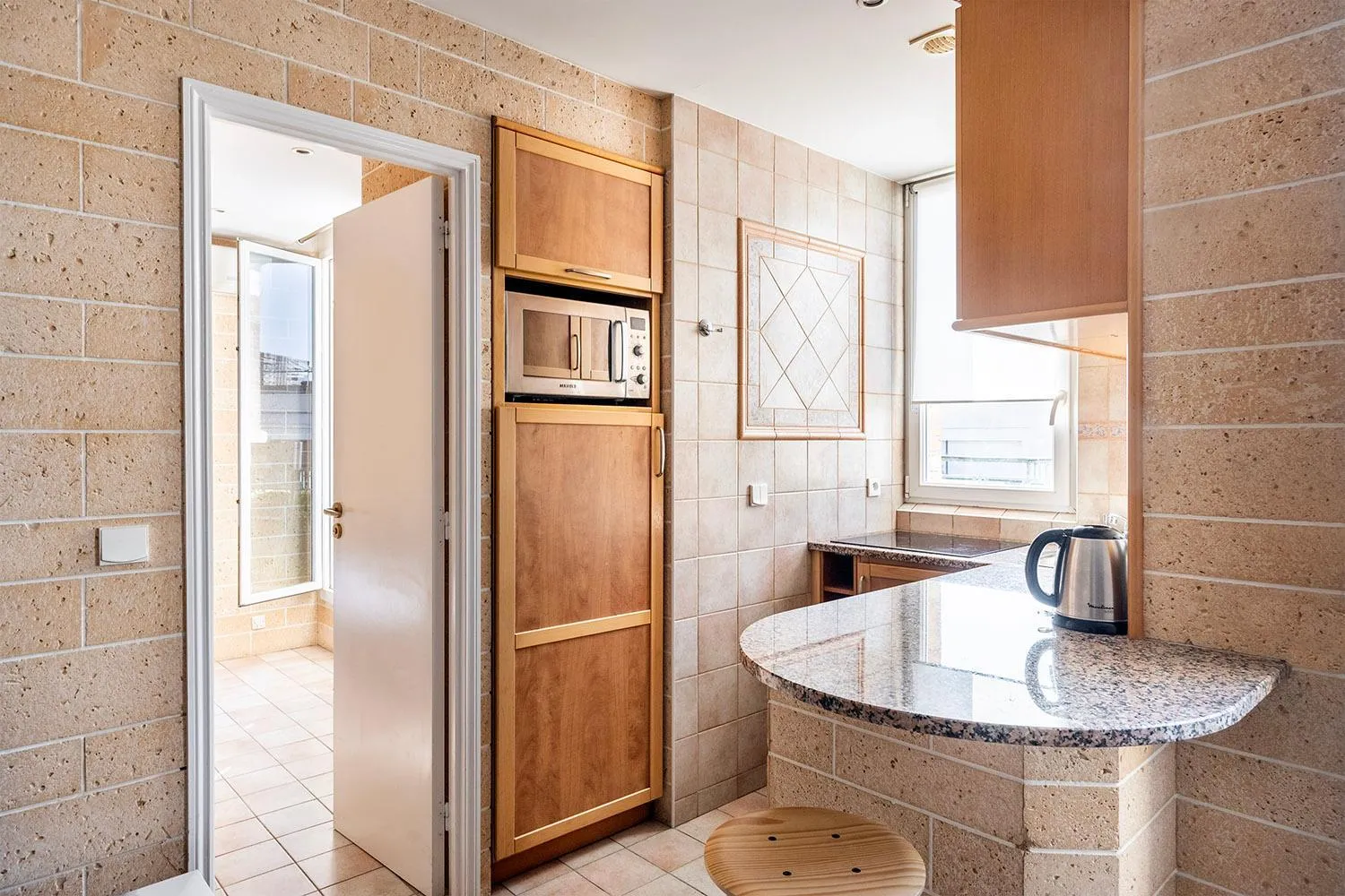 Kitchen or kitchenette in Appart Hôtel Résidence Courcelle