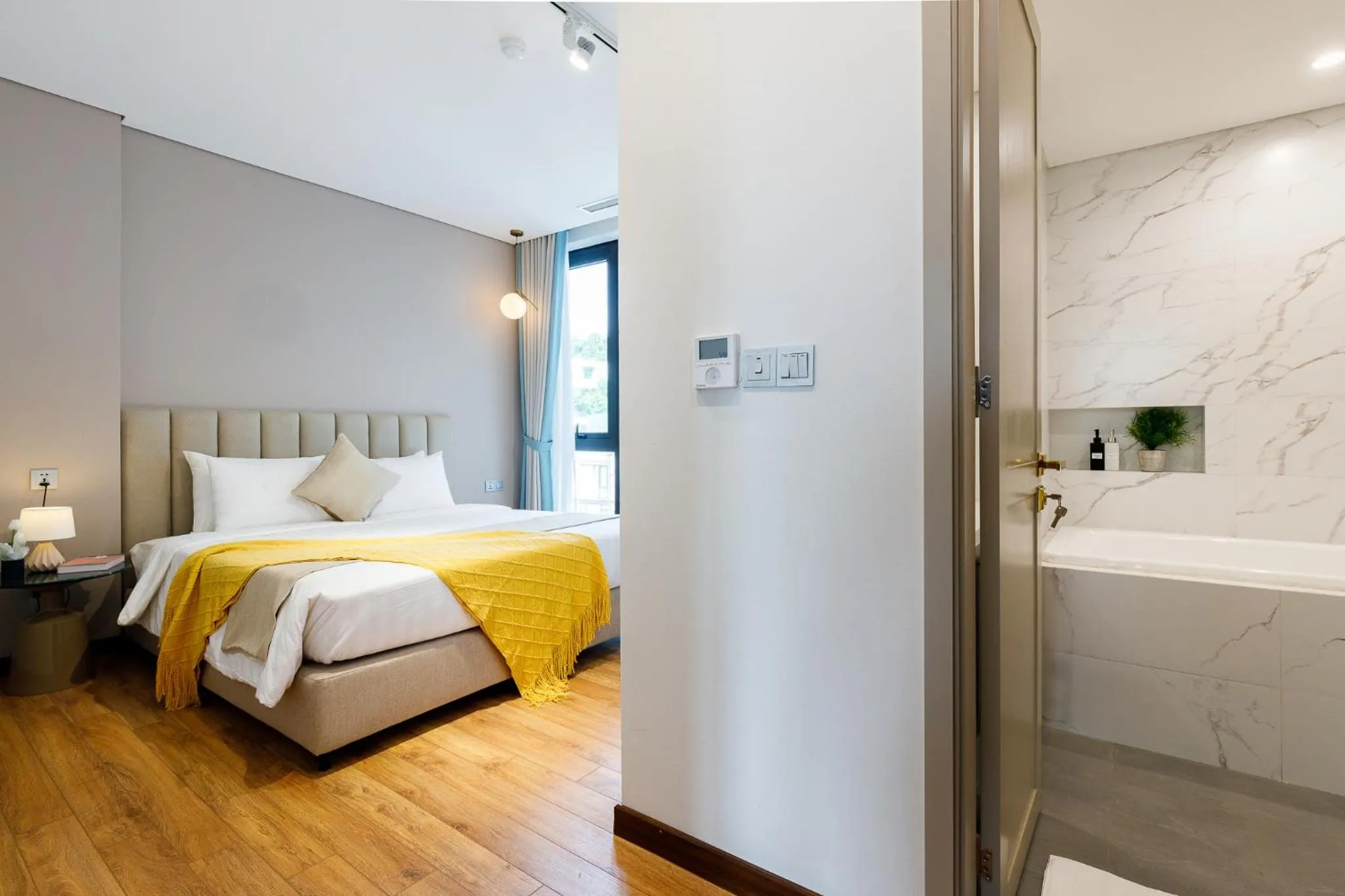 Bed in Margaery Boutique Apartment & Skyon9 Rooftop Bar