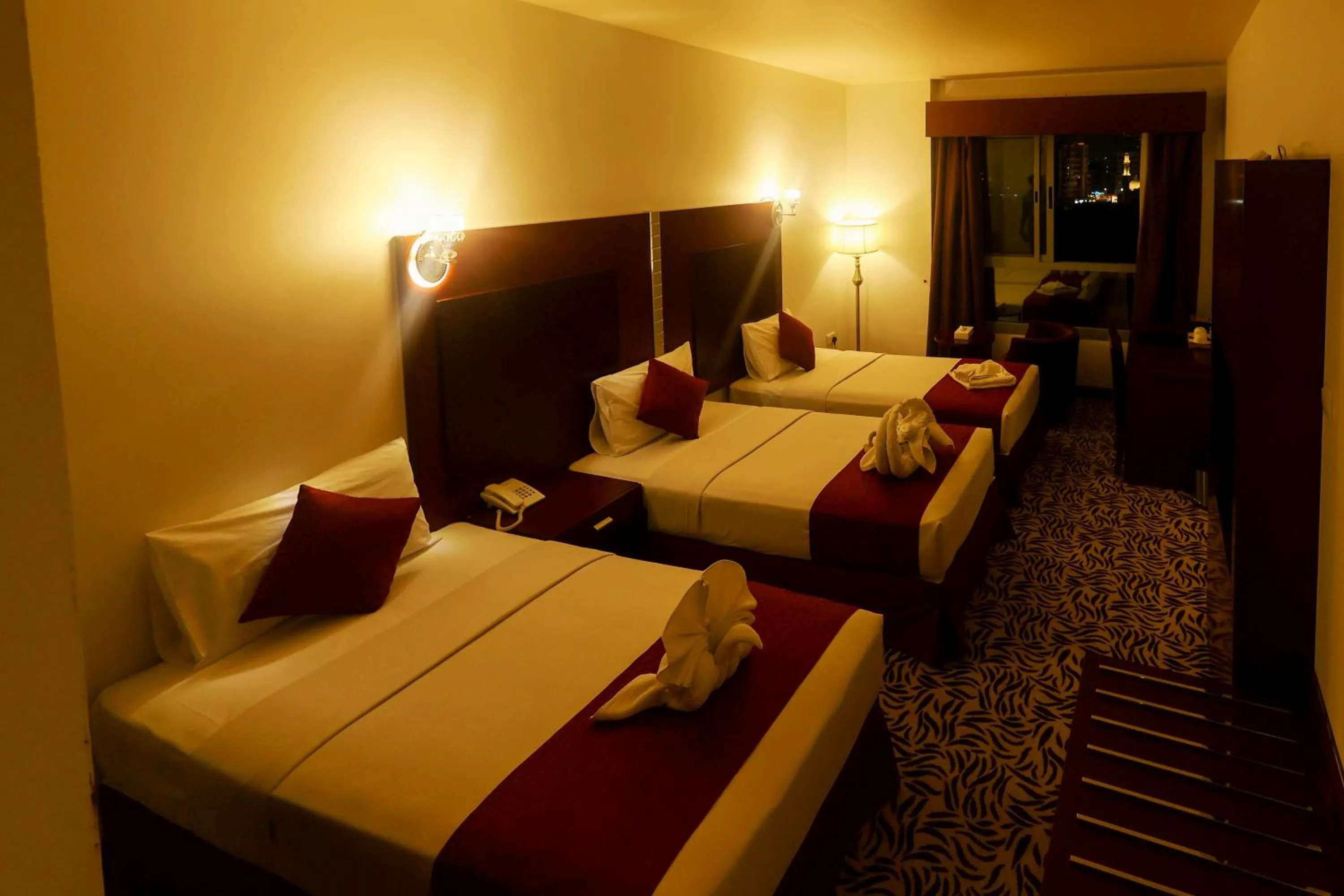 Bed in MRA Grand Hotel