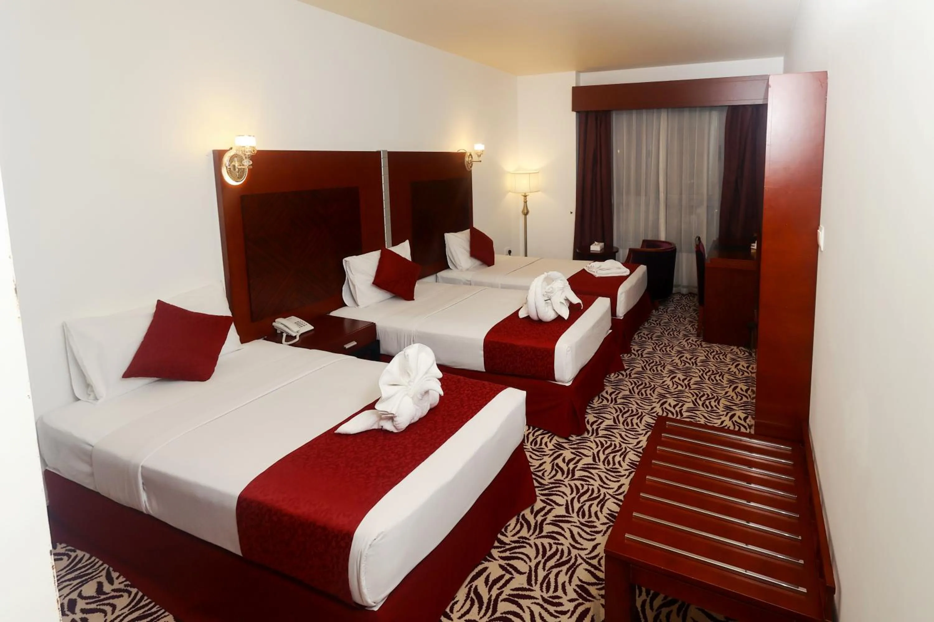 Bed in MRA Grand Hotel