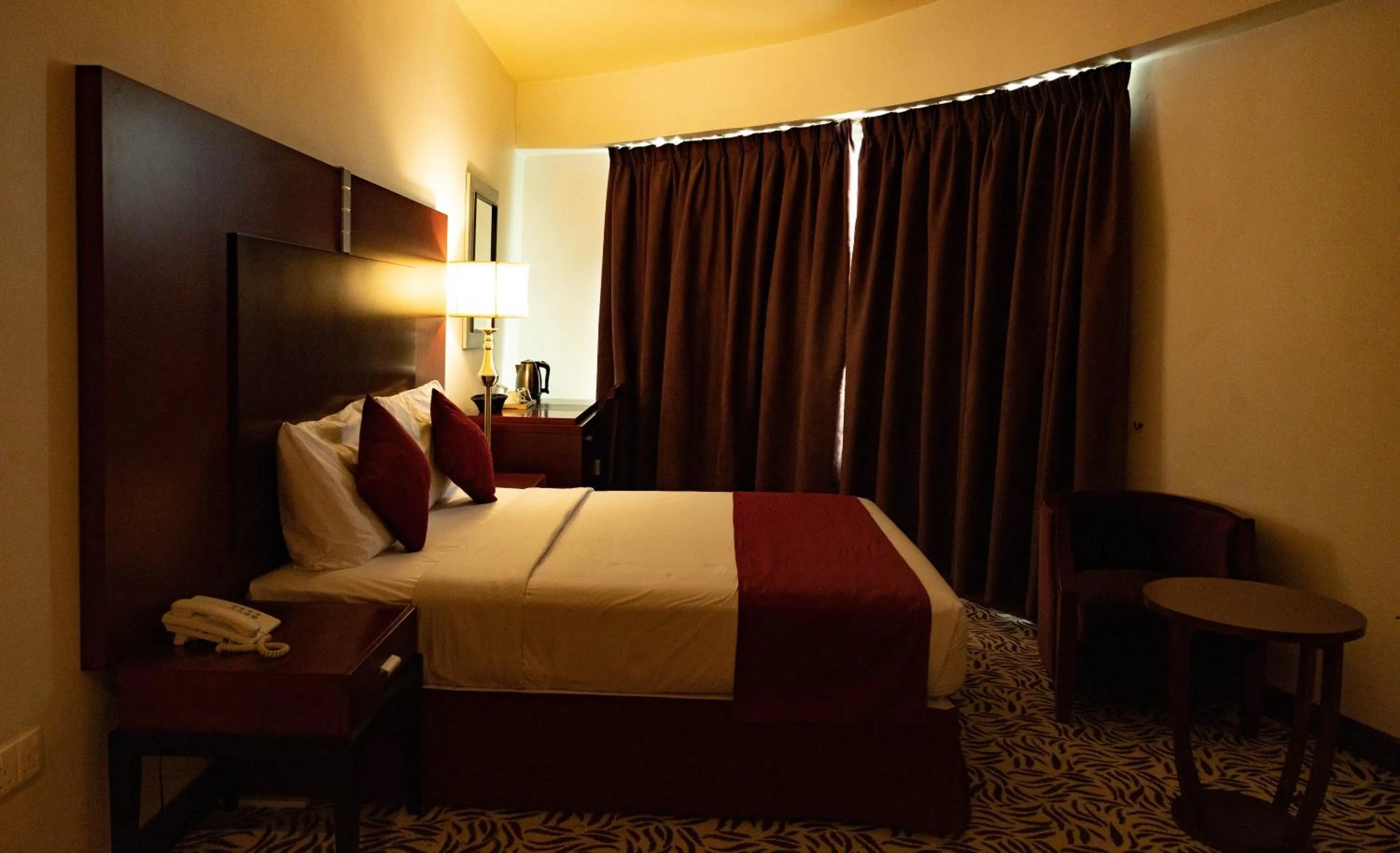 Bed in MRA Grand Hotel