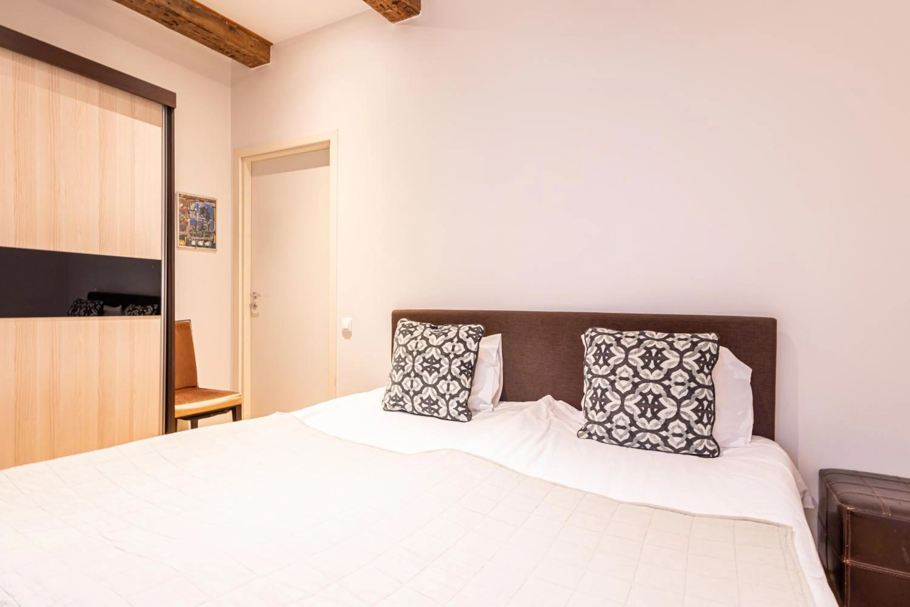 Bed in Yoga Residence Apartments