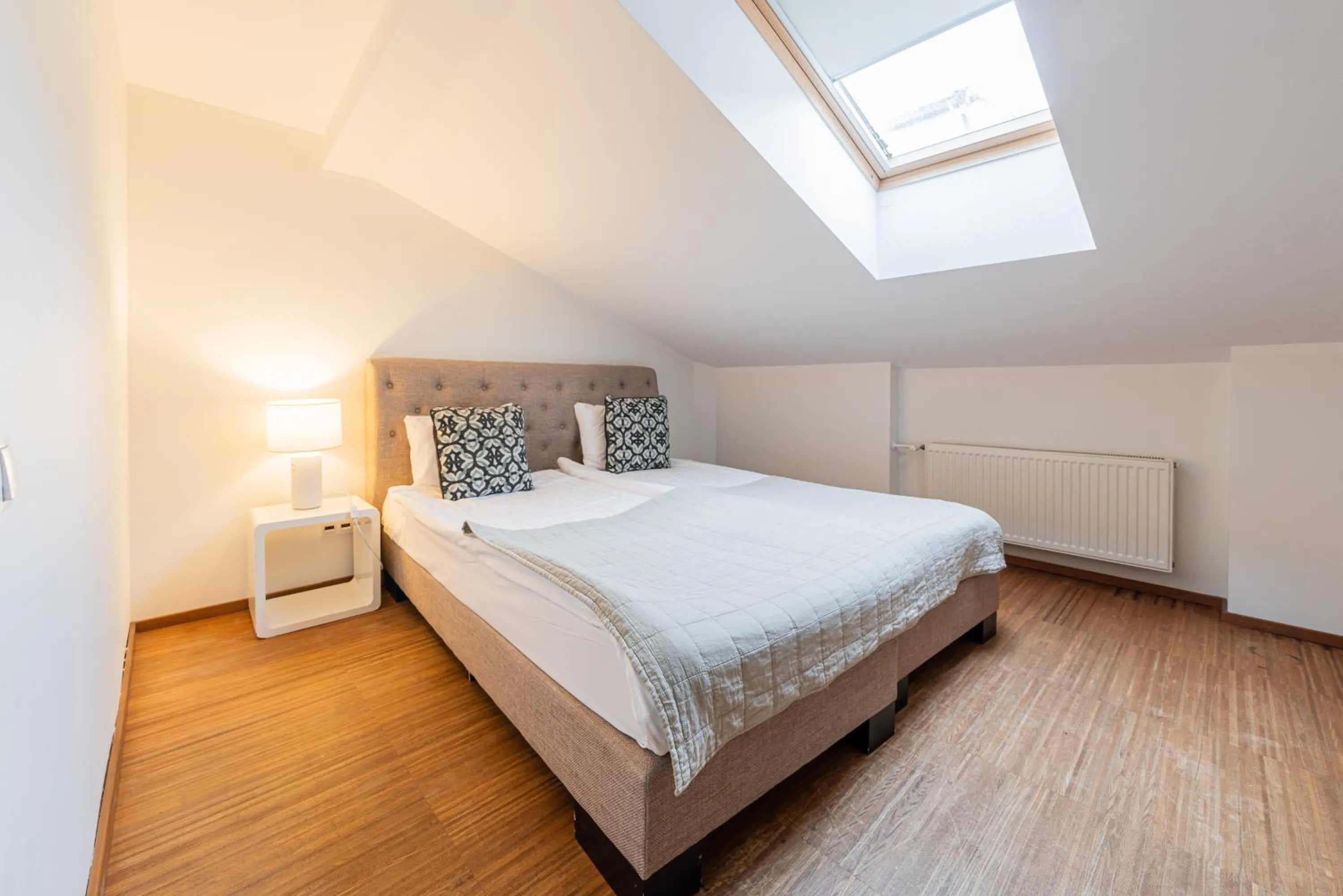 Bed in Yoga Residence Apartments