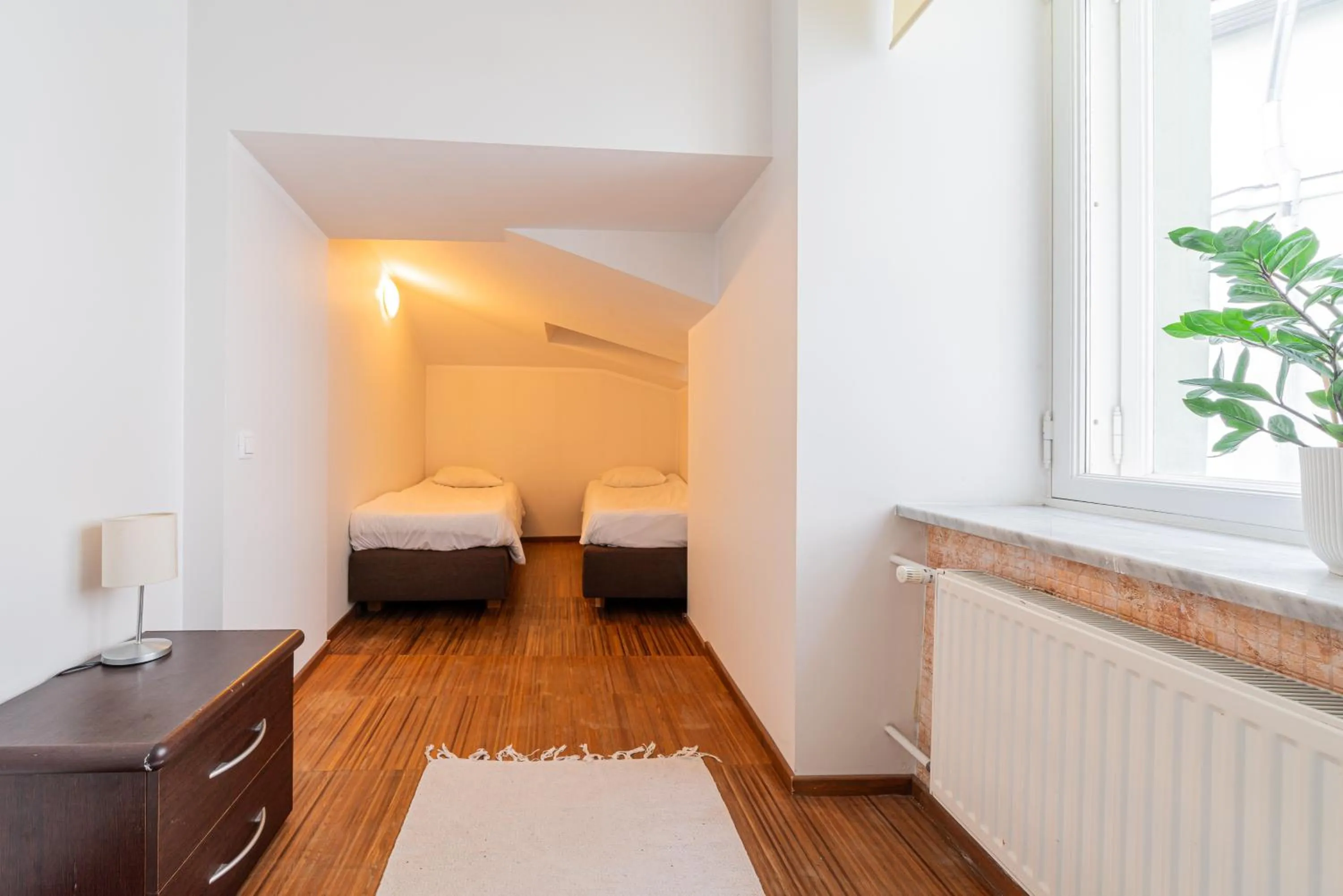 Bed in Yoga Residence Apartments