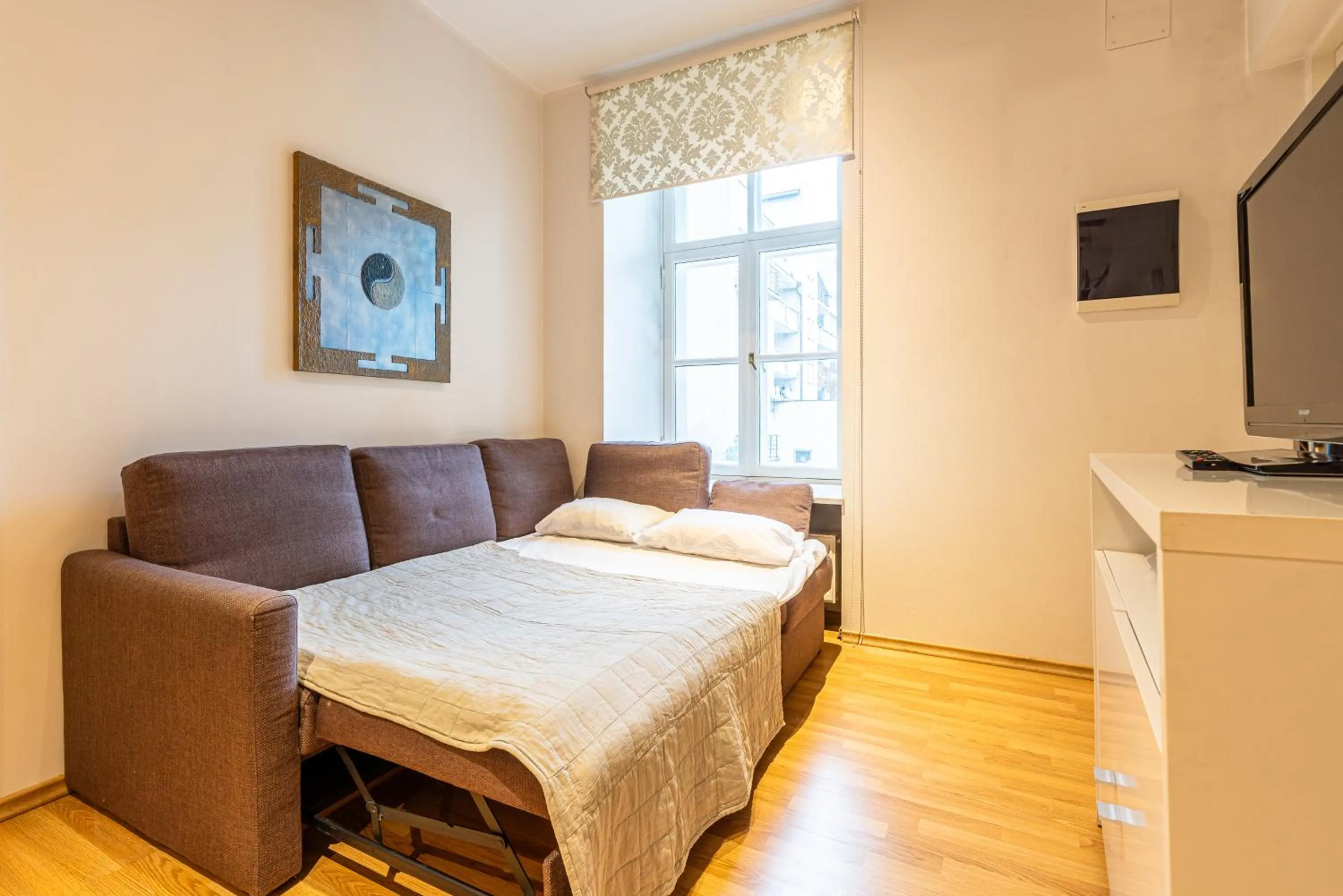 Bed in Yoga Residence Apartments