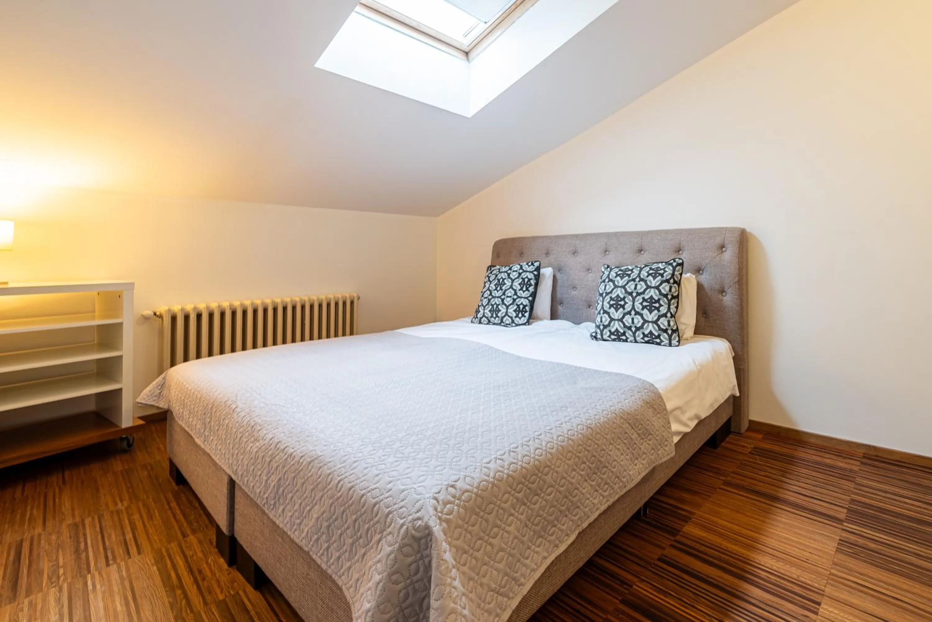 Bed in Yoga Residence Apartments