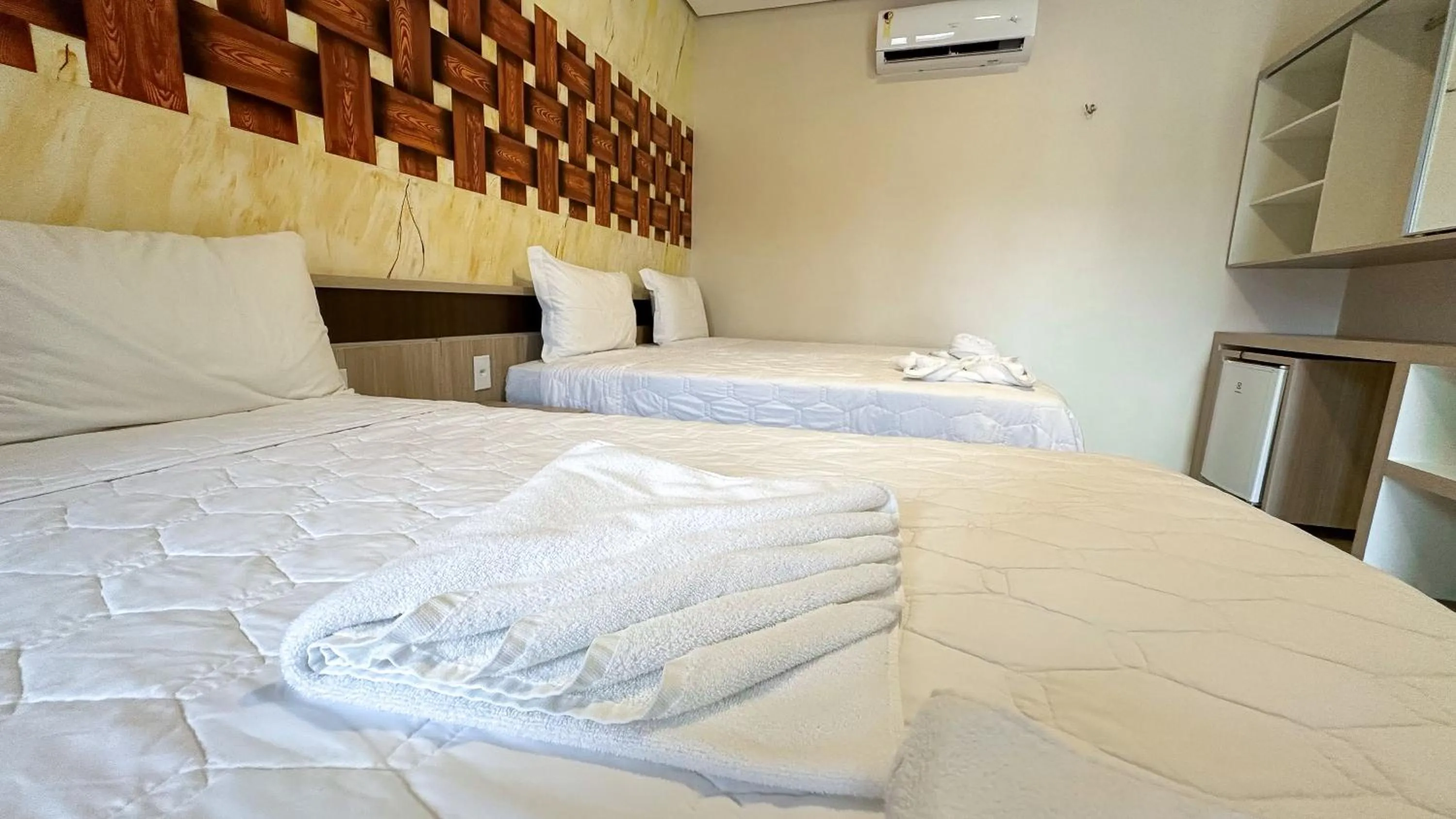 Bed in Pousada Lençóis Maranhenses