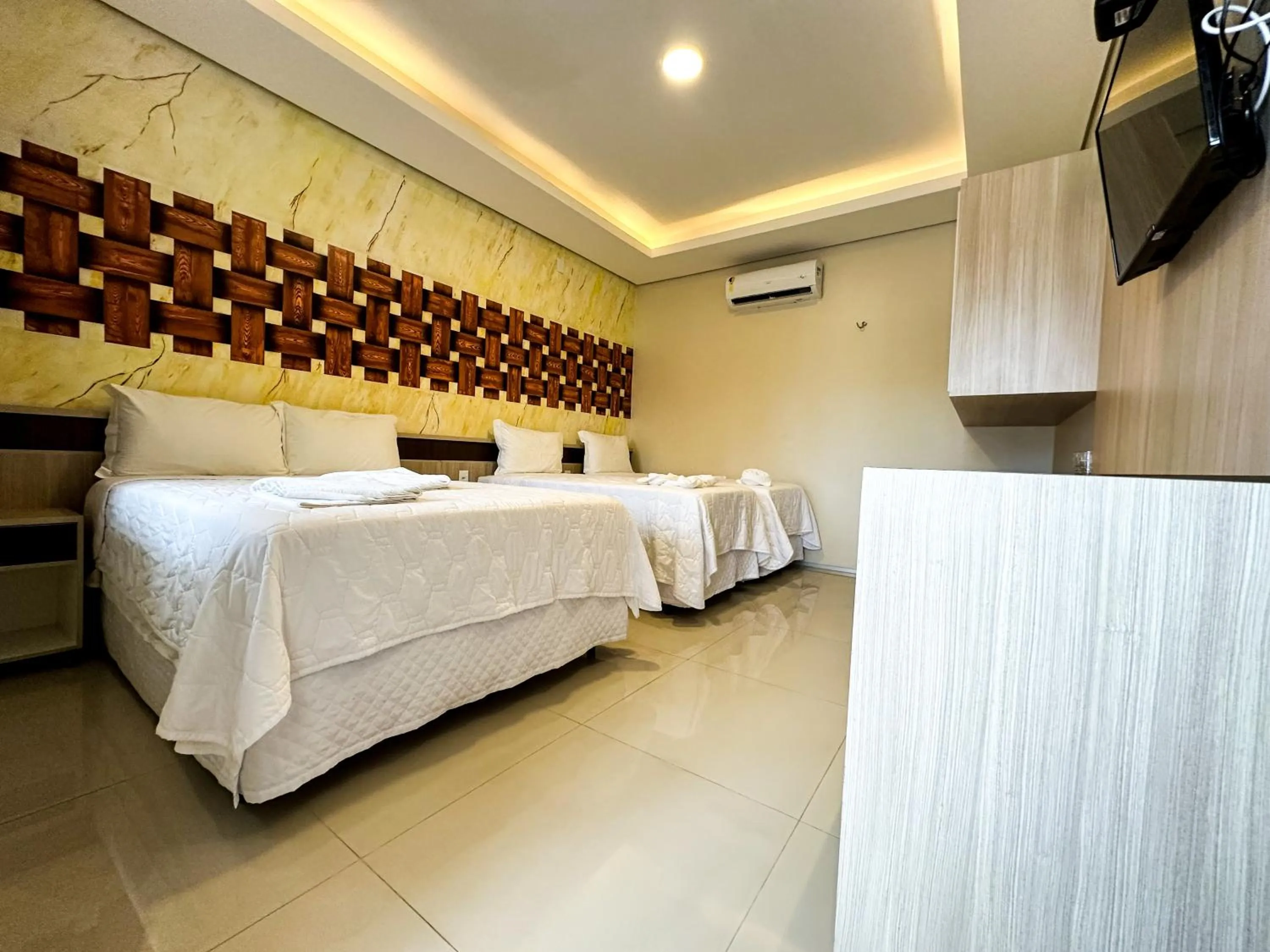 Bed in Pousada Lençóis Maranhenses