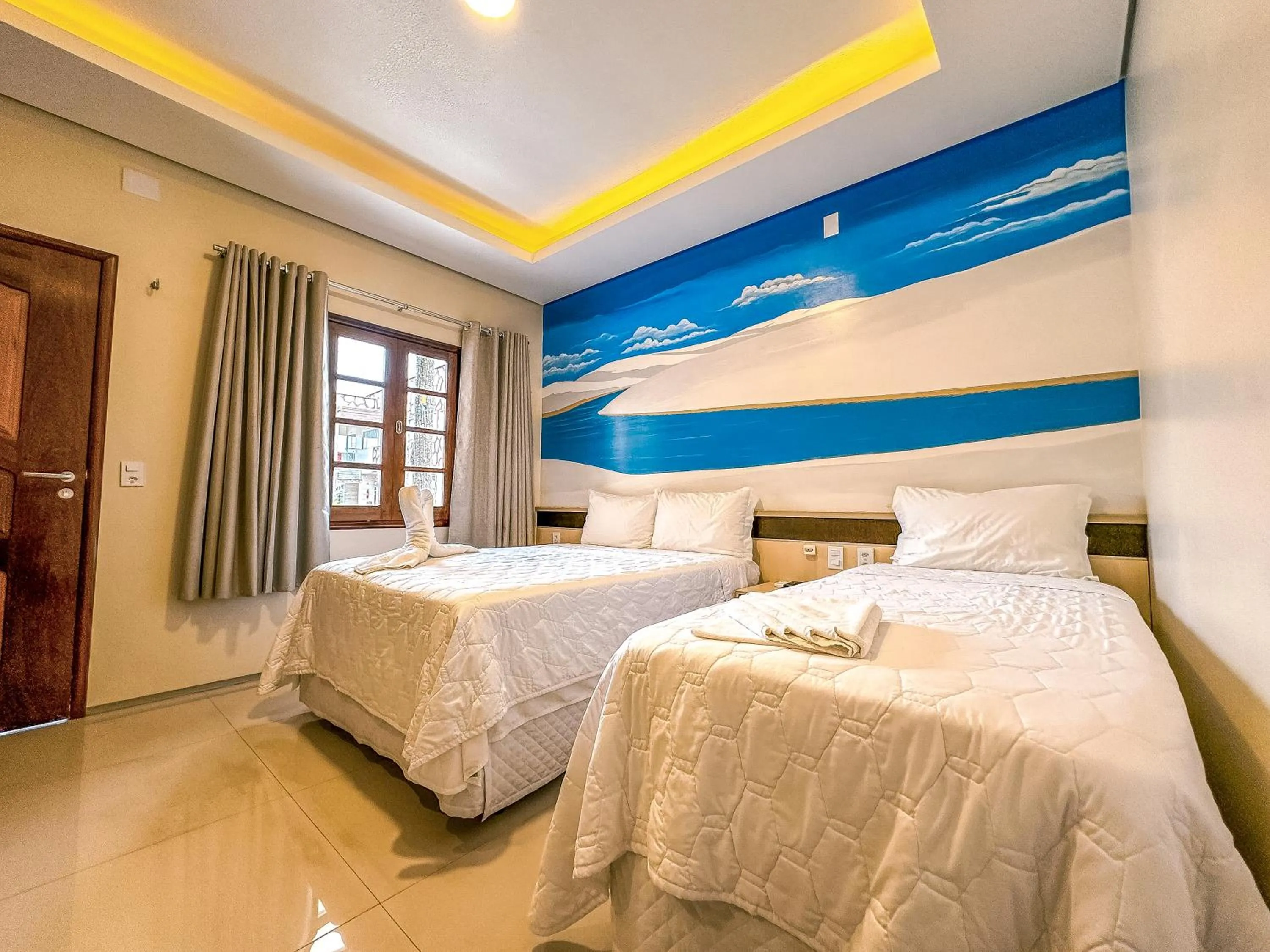 Bed in Pousada Lençóis Maranhenses