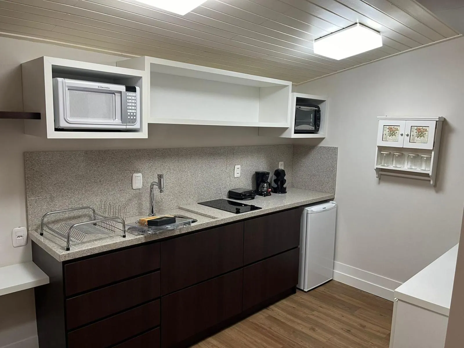 Kitchen or kitchenette in Flat em Gramado