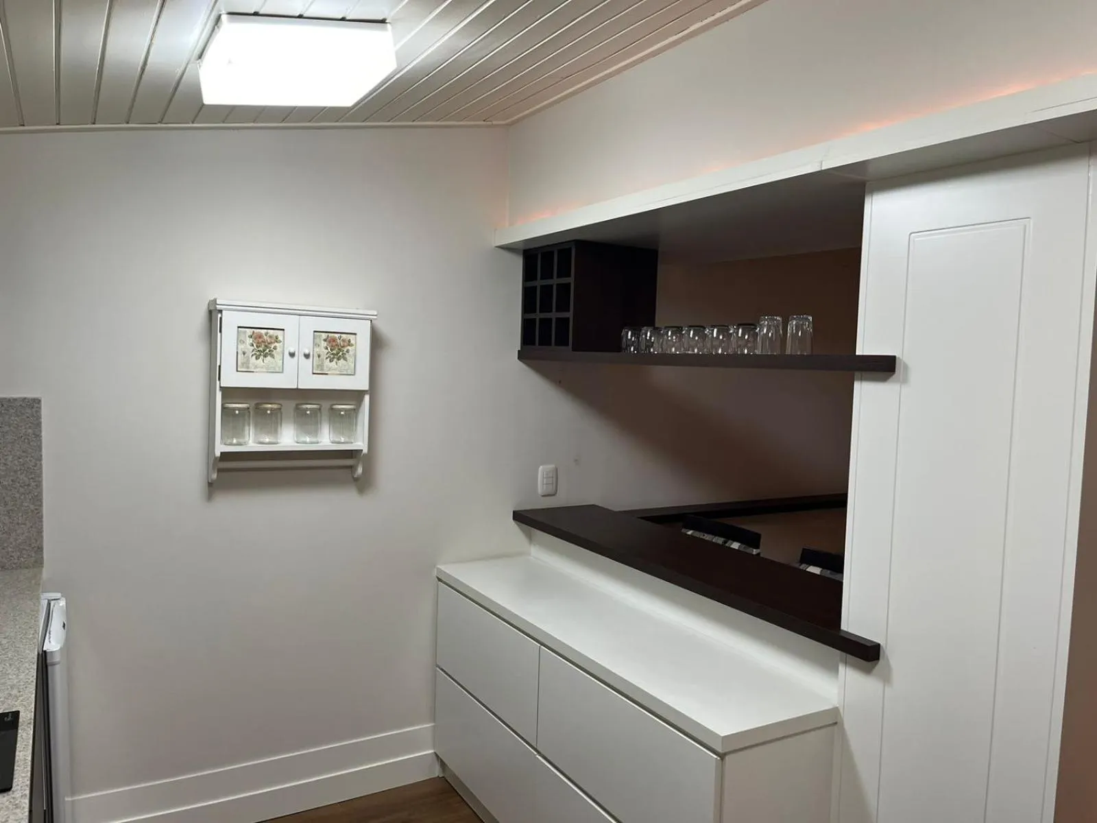 Kitchen or kitchenette in Flat em Gramado