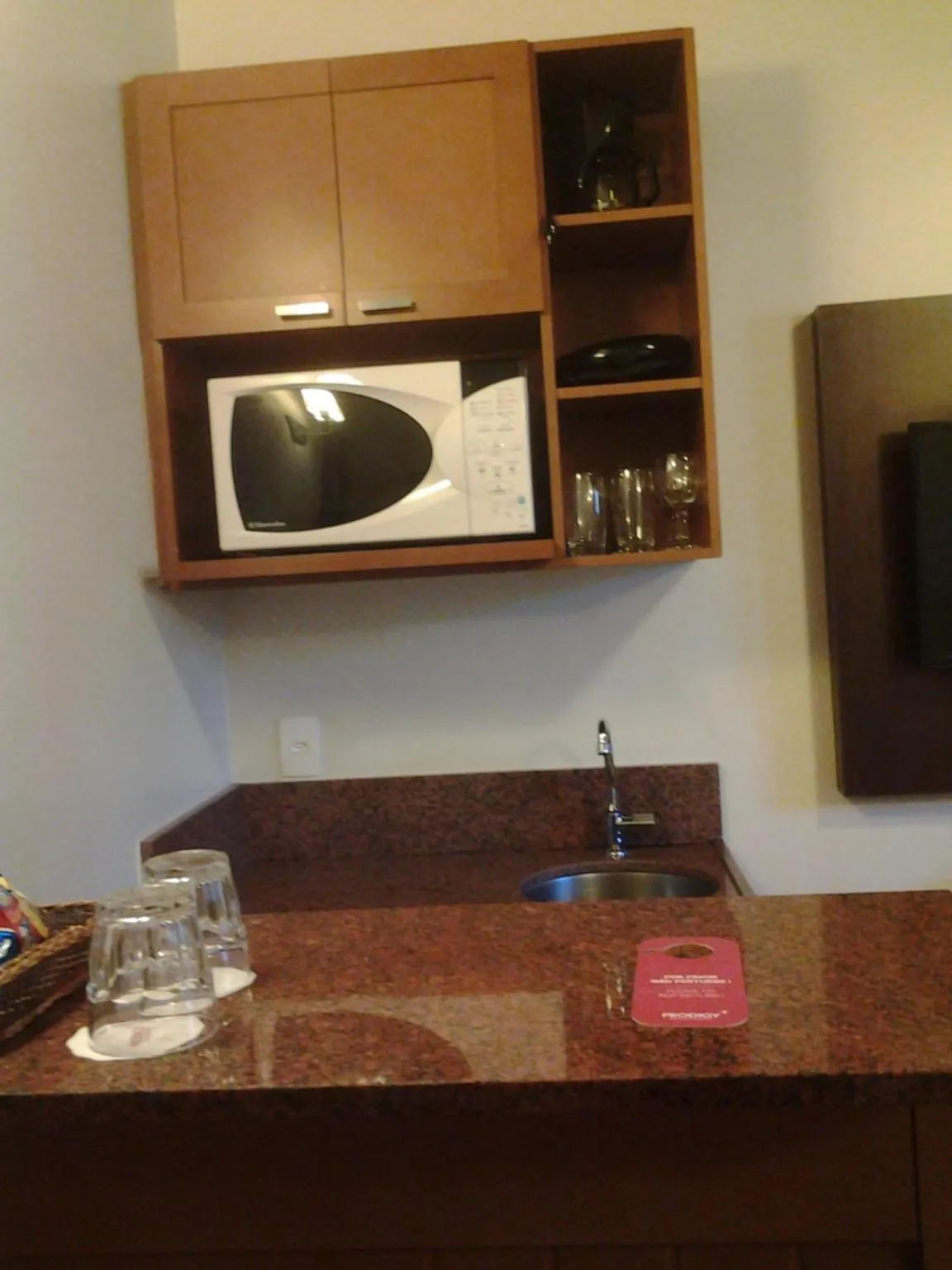 Kitchen or kitchenette in Flat em Gramado