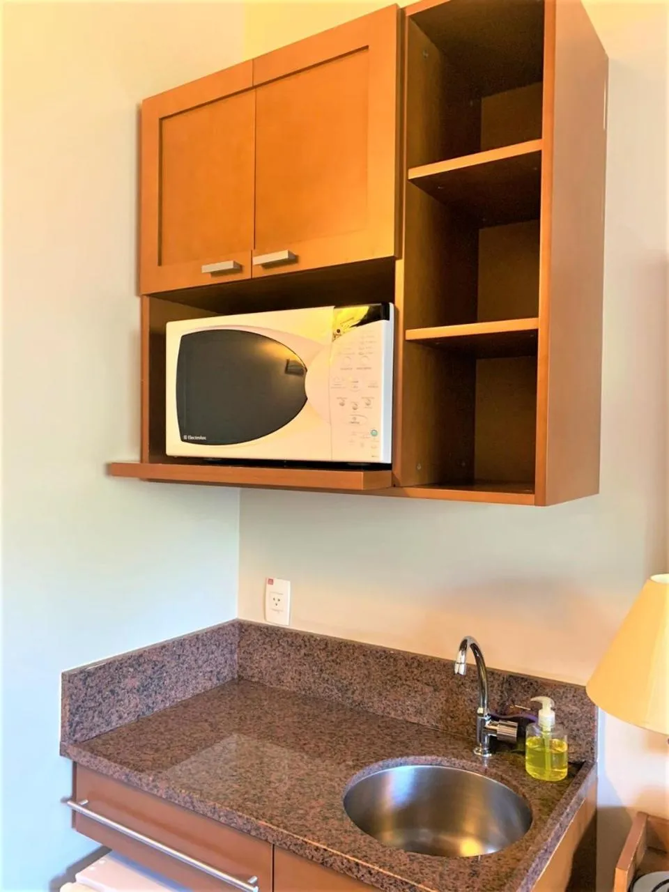 Kitchen or kitchenette in Flat em Gramado