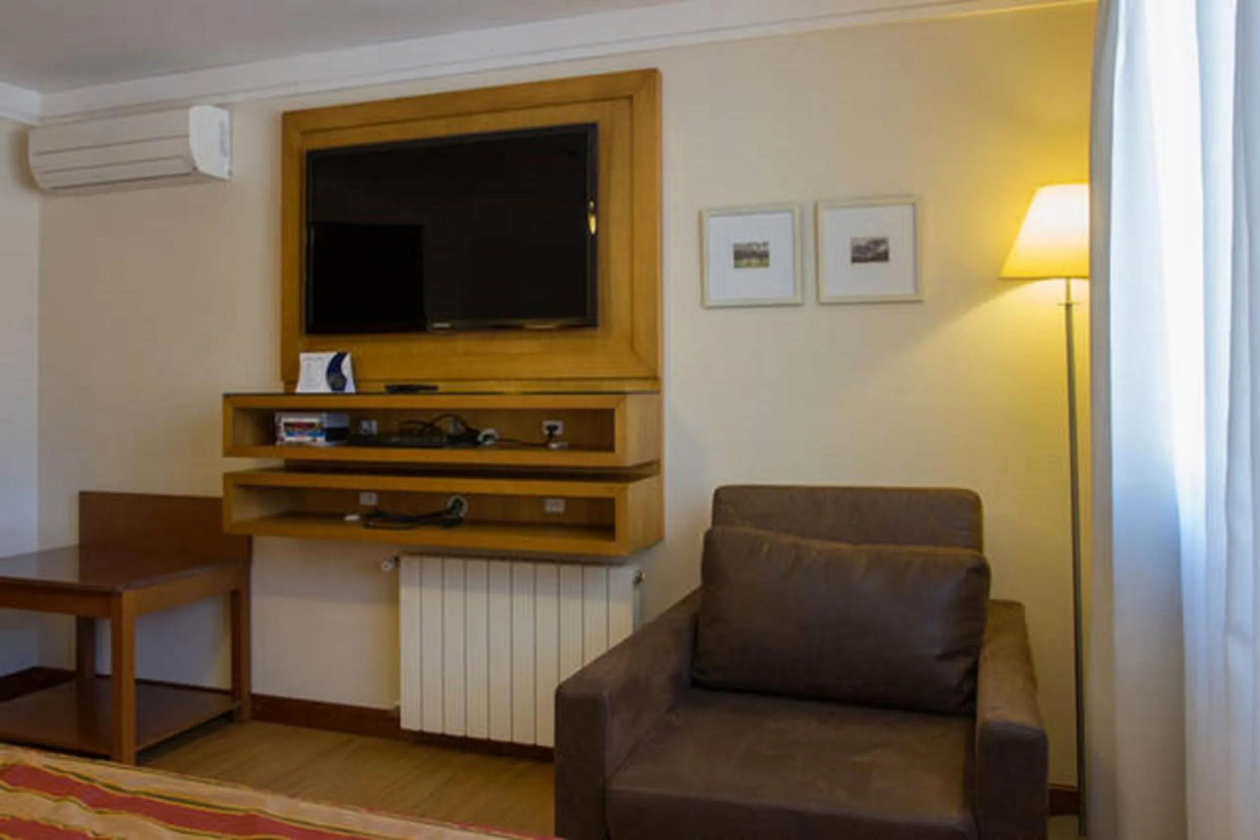 Photo of the whole room in Flat em Gramado