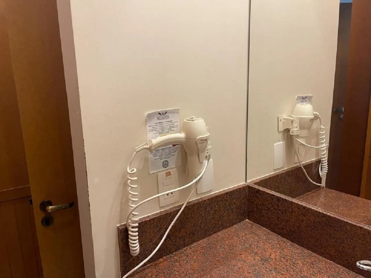 Bathroom in Flat em Gramado