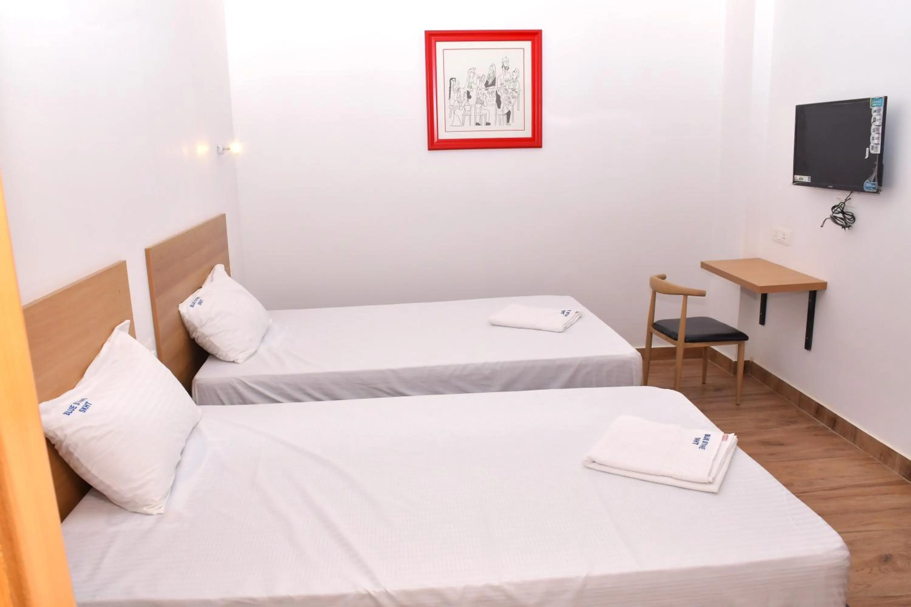 Bed in Hotel Bluestone