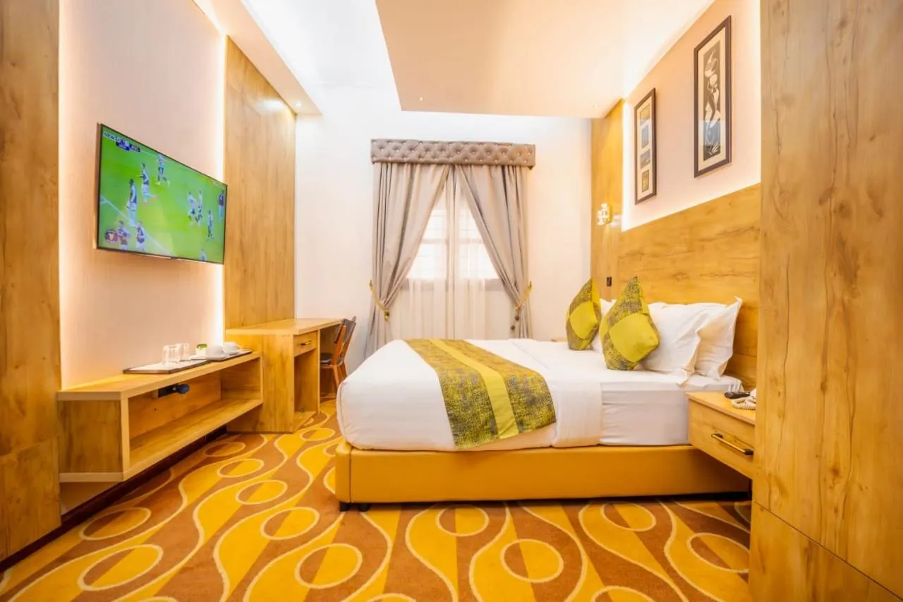 Bed in Afro Park Hotel