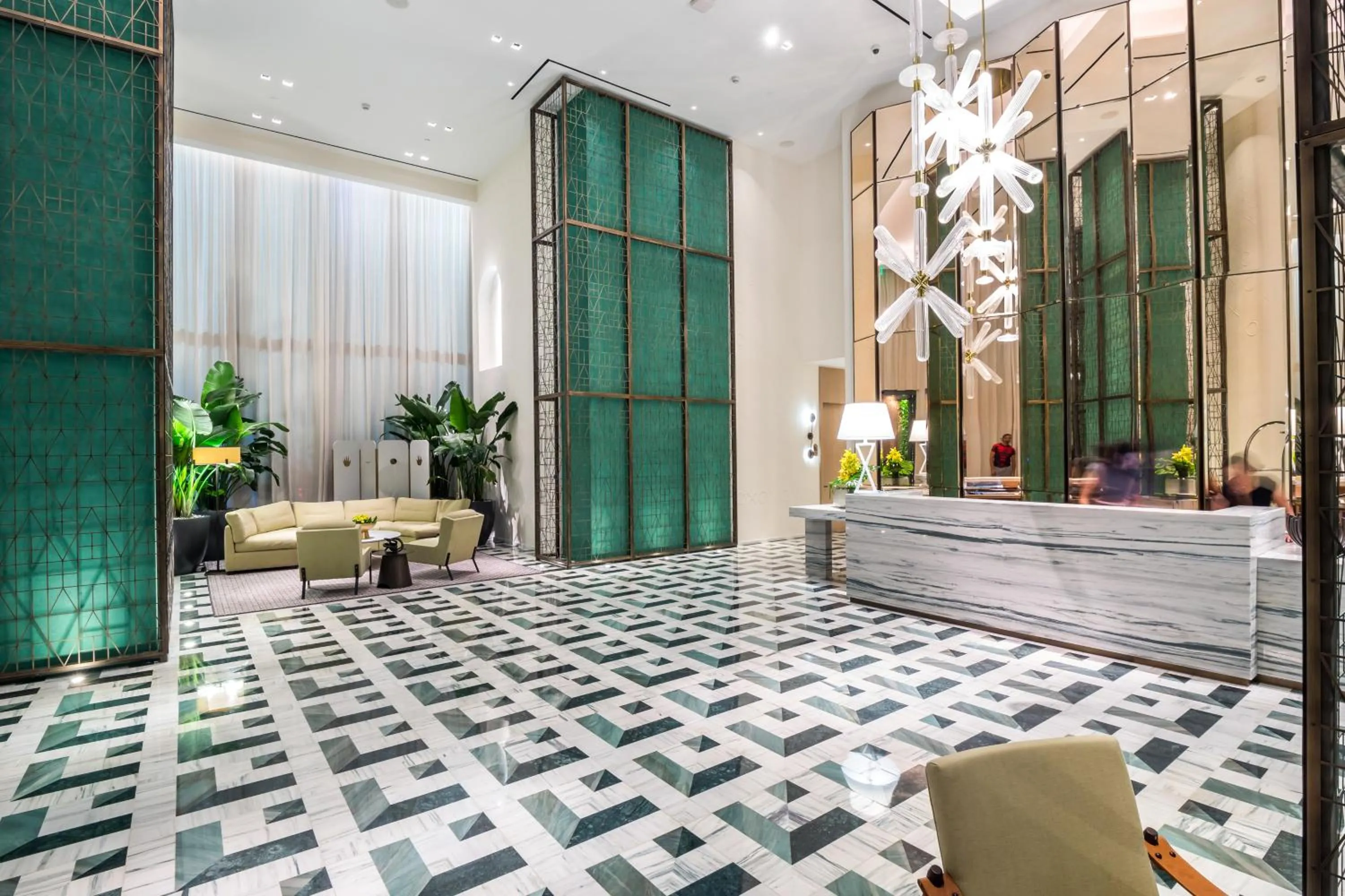 Lobby or reception in Suites at SLS Lux Brickell managed by CE