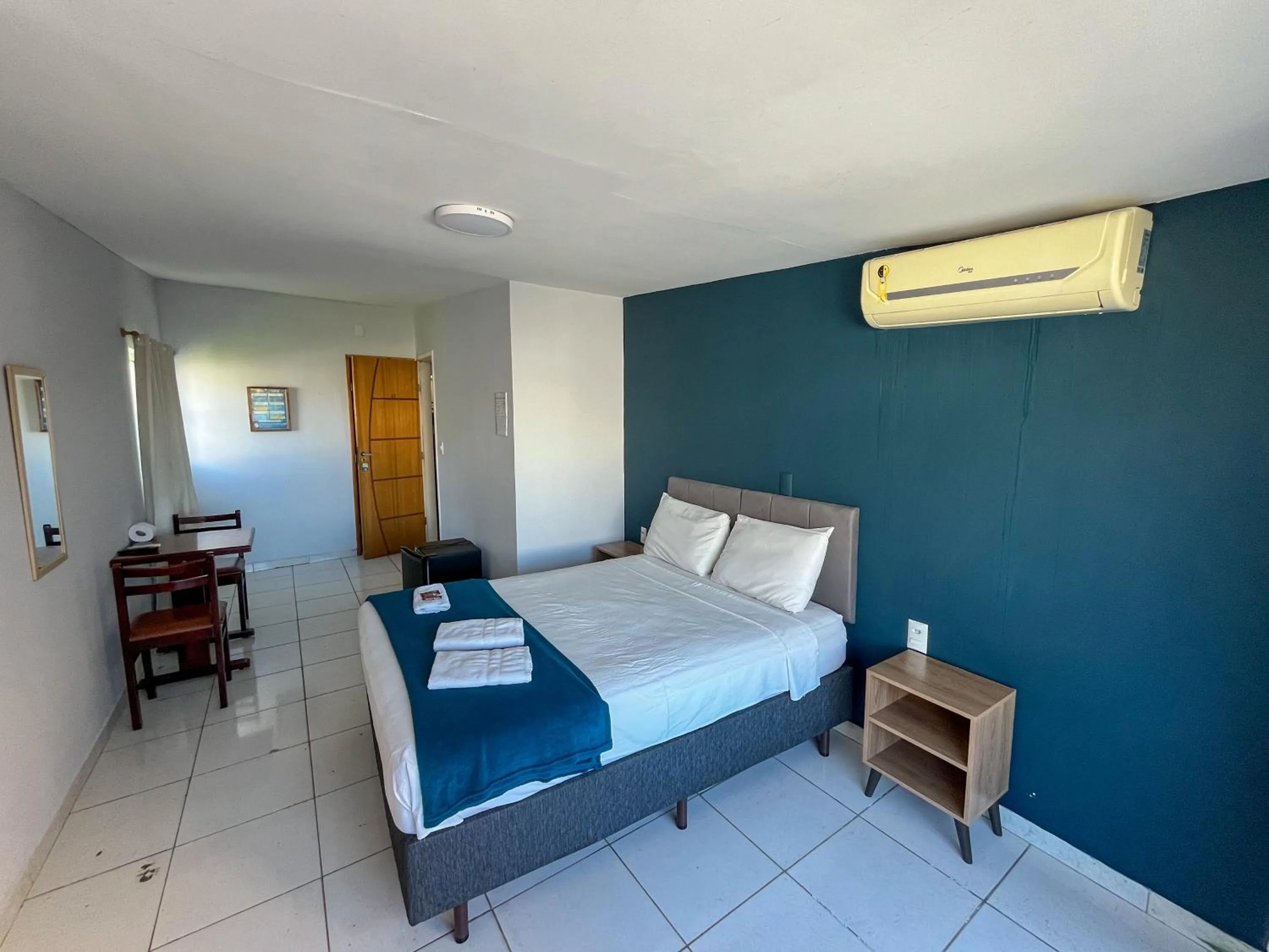 Photo of the whole room, Bed in Pousada Vila Appia