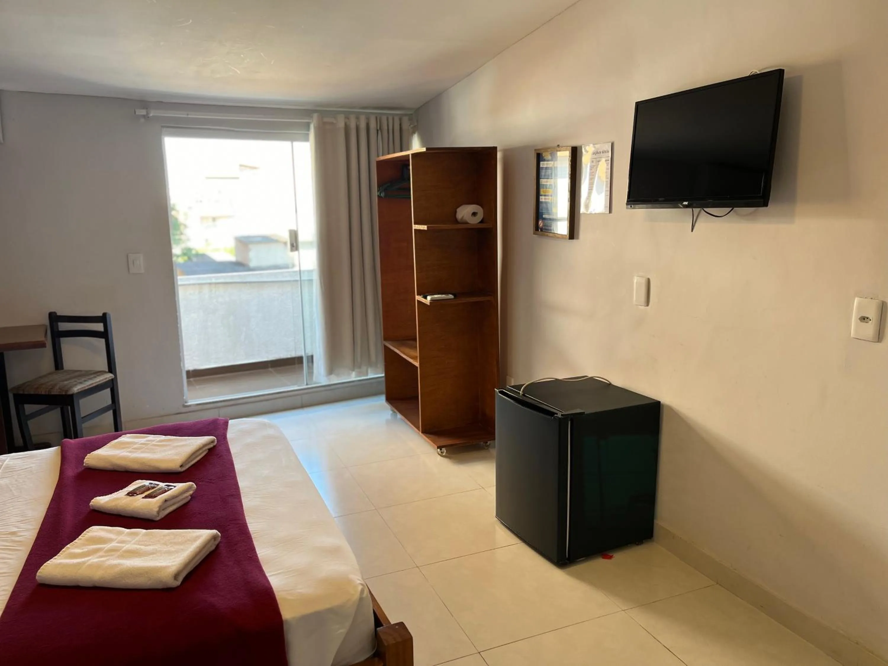 TV and multimedia, Bed in Pousada Vila Appia