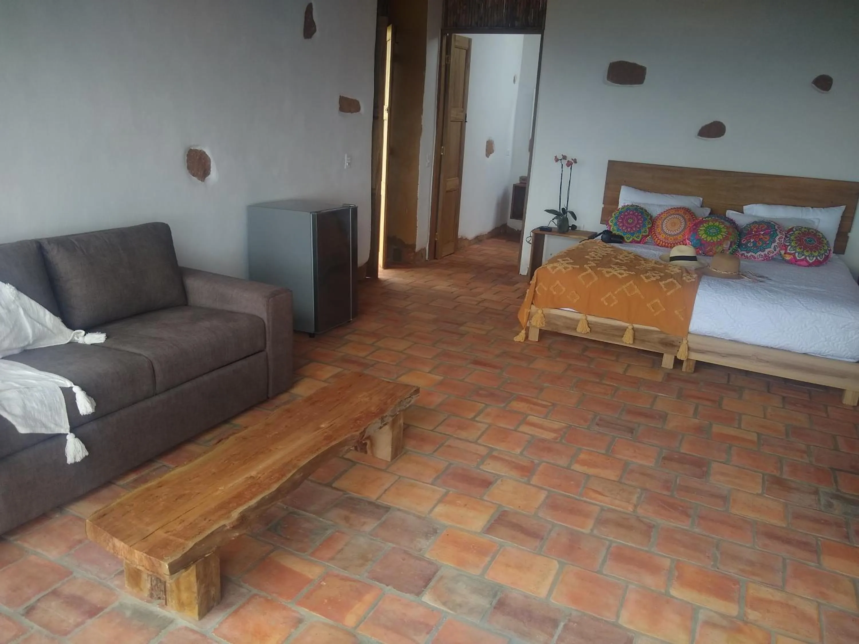 Living room, Bed in Hotel Cariguá