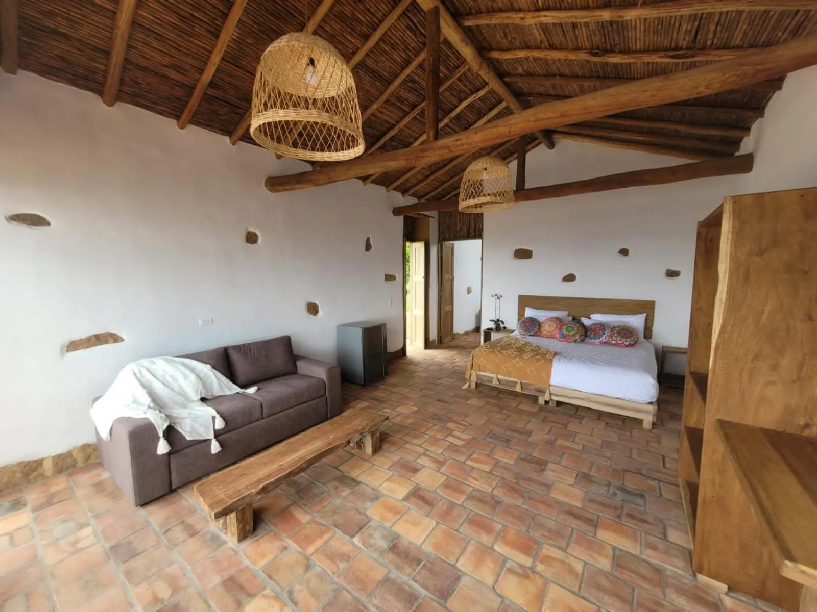 Living room, Bed in Hotel Cariguá