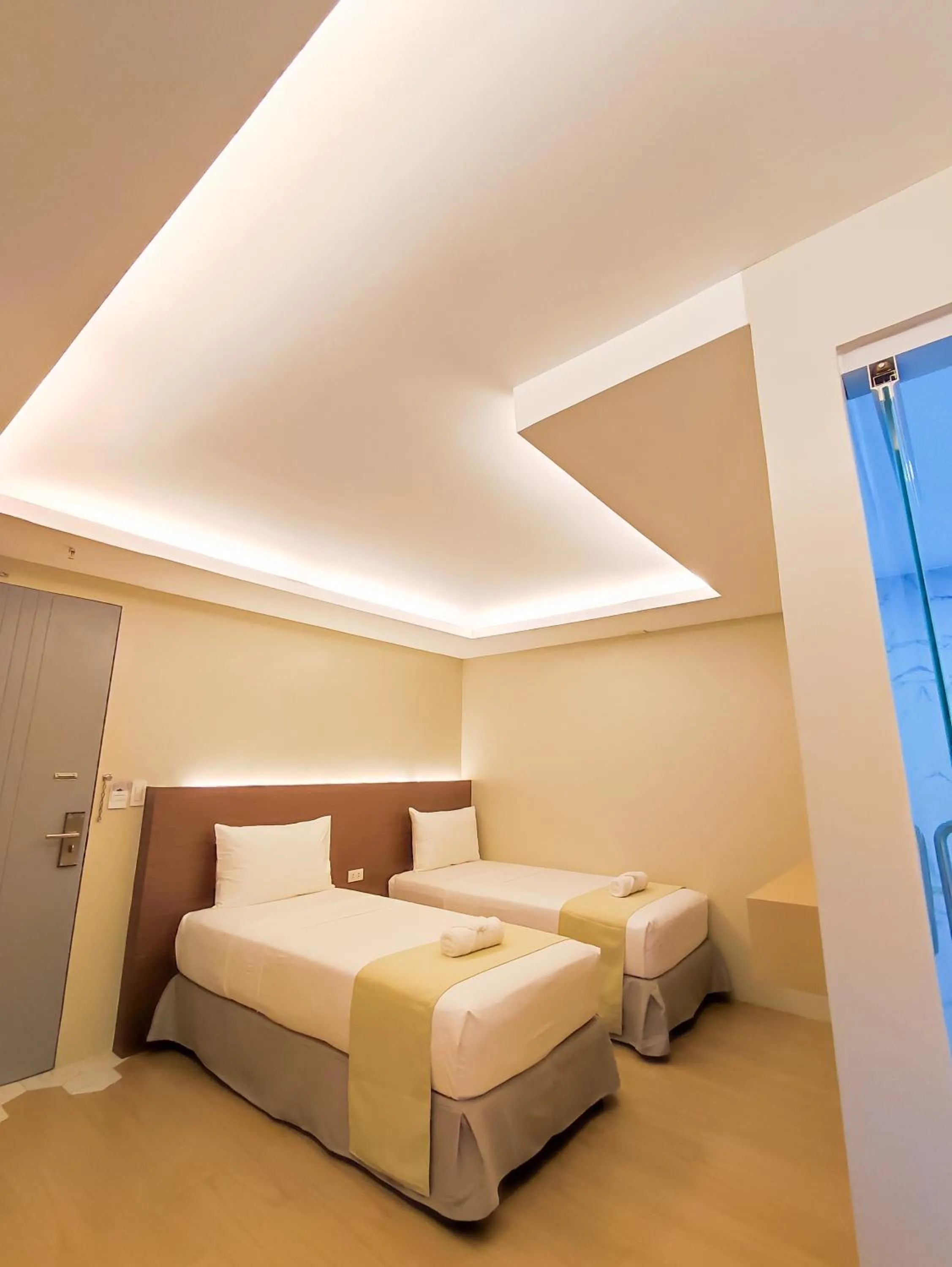 Bed in Hotel Simone Kalibo