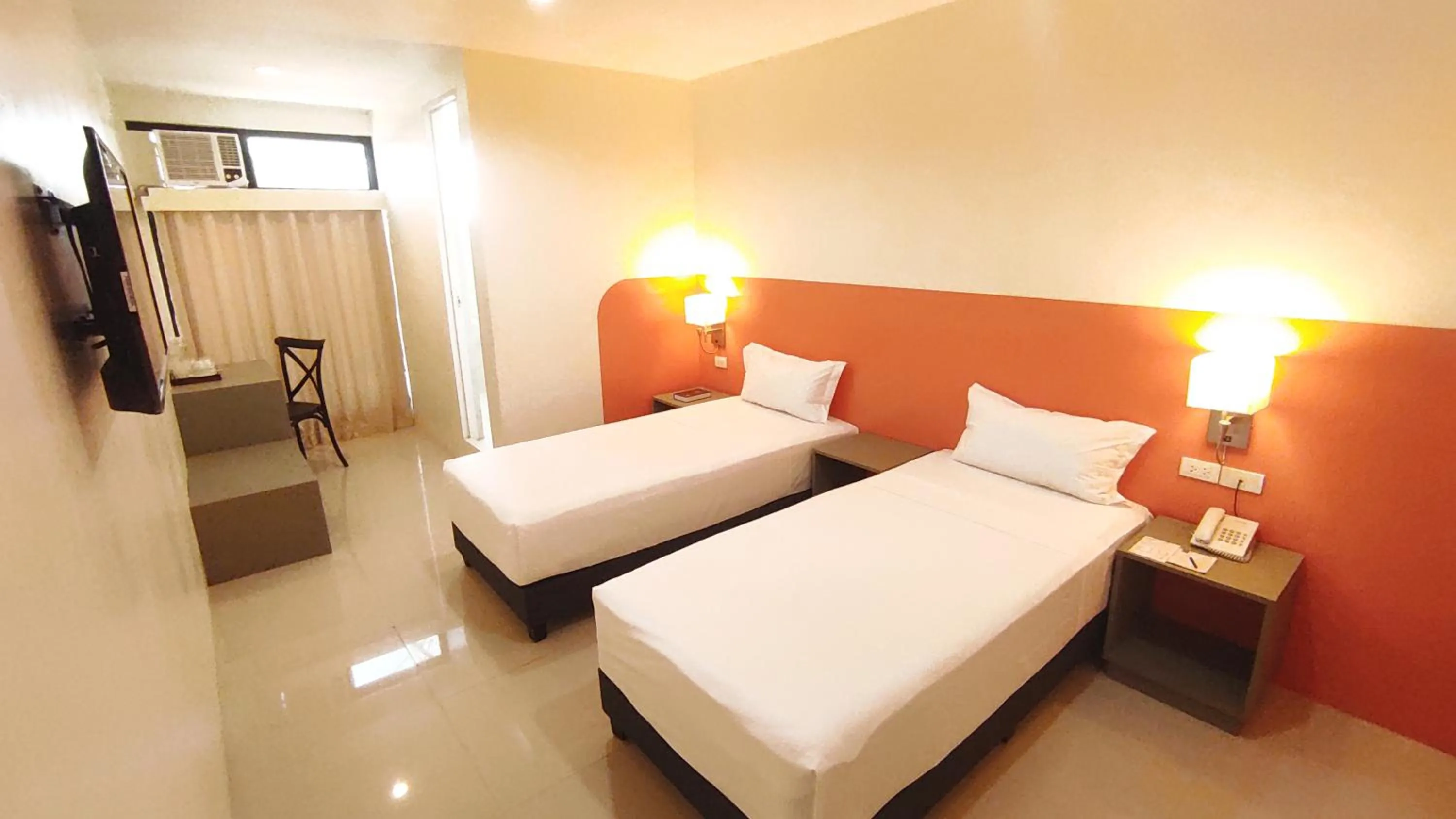 Bedroom in Travelbee Airport Inn