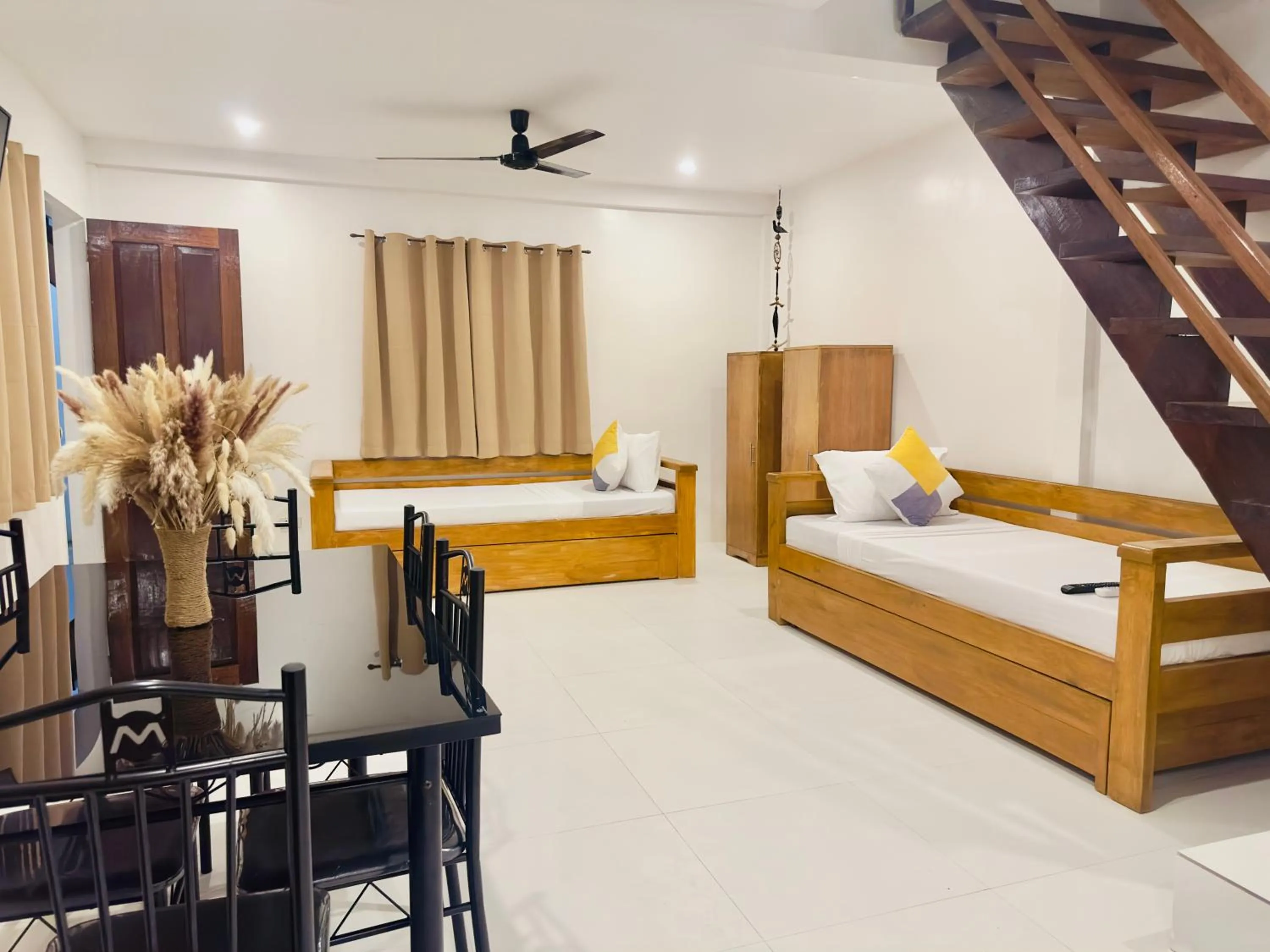 Bed in Palmera El Nido Inn