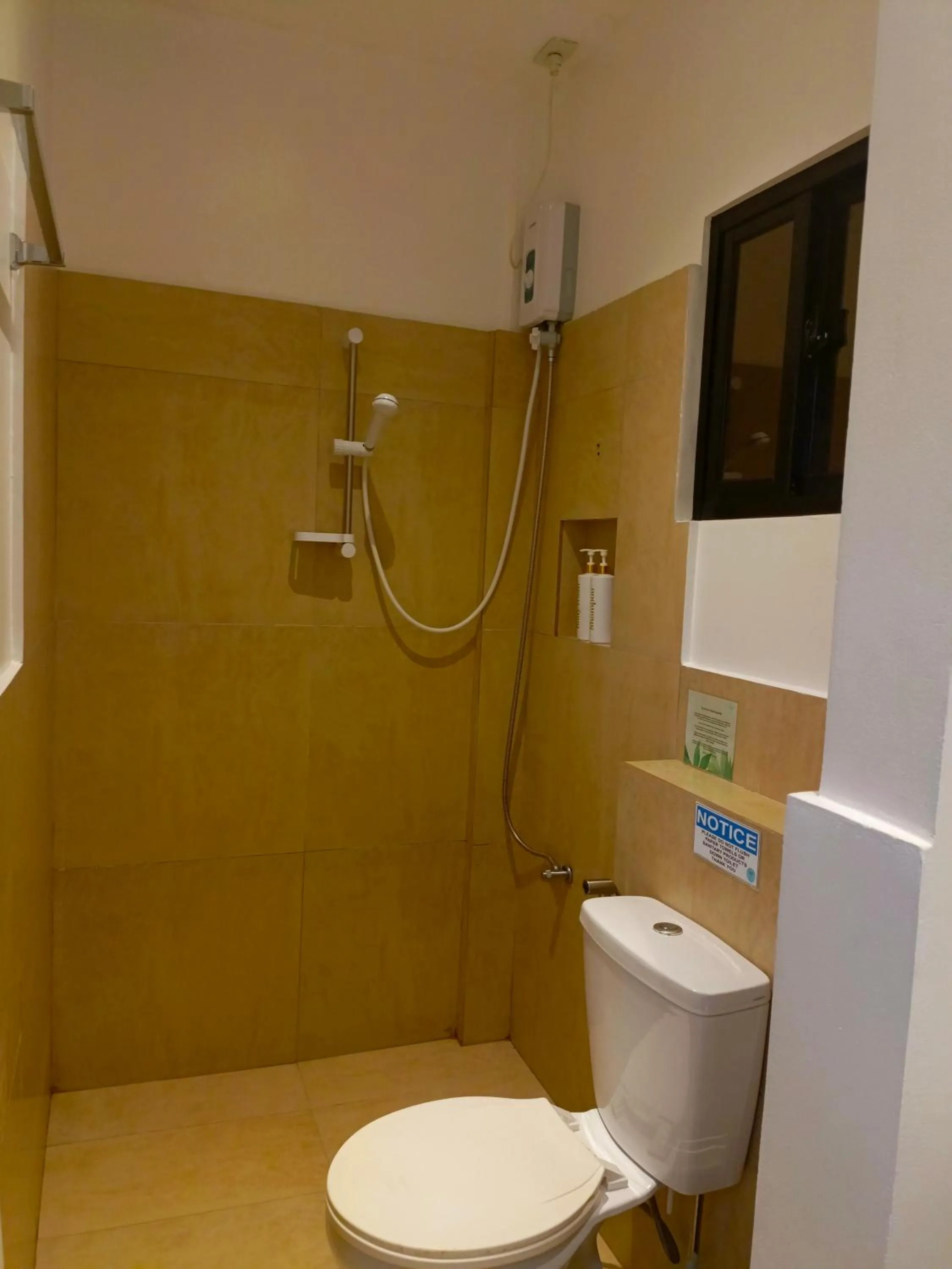 Bathroom in Palmera El Nido Inn