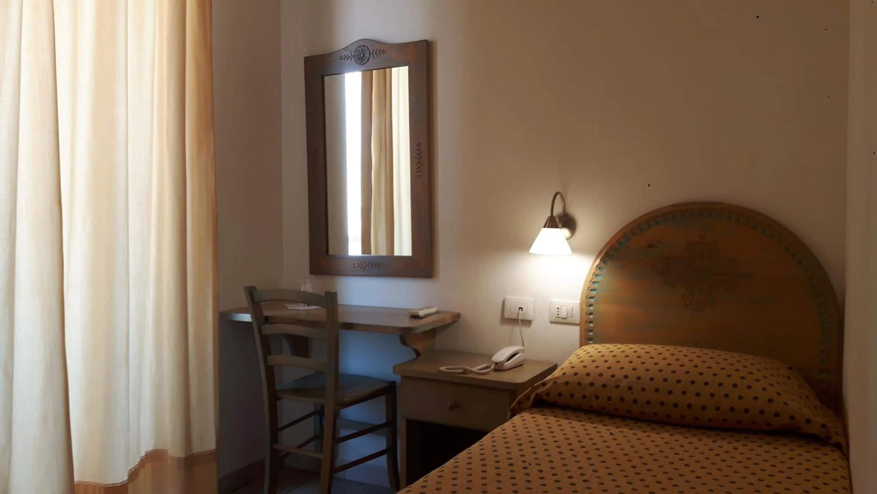 Photo of the whole room, Bed in Alghero Vacanze Hotel