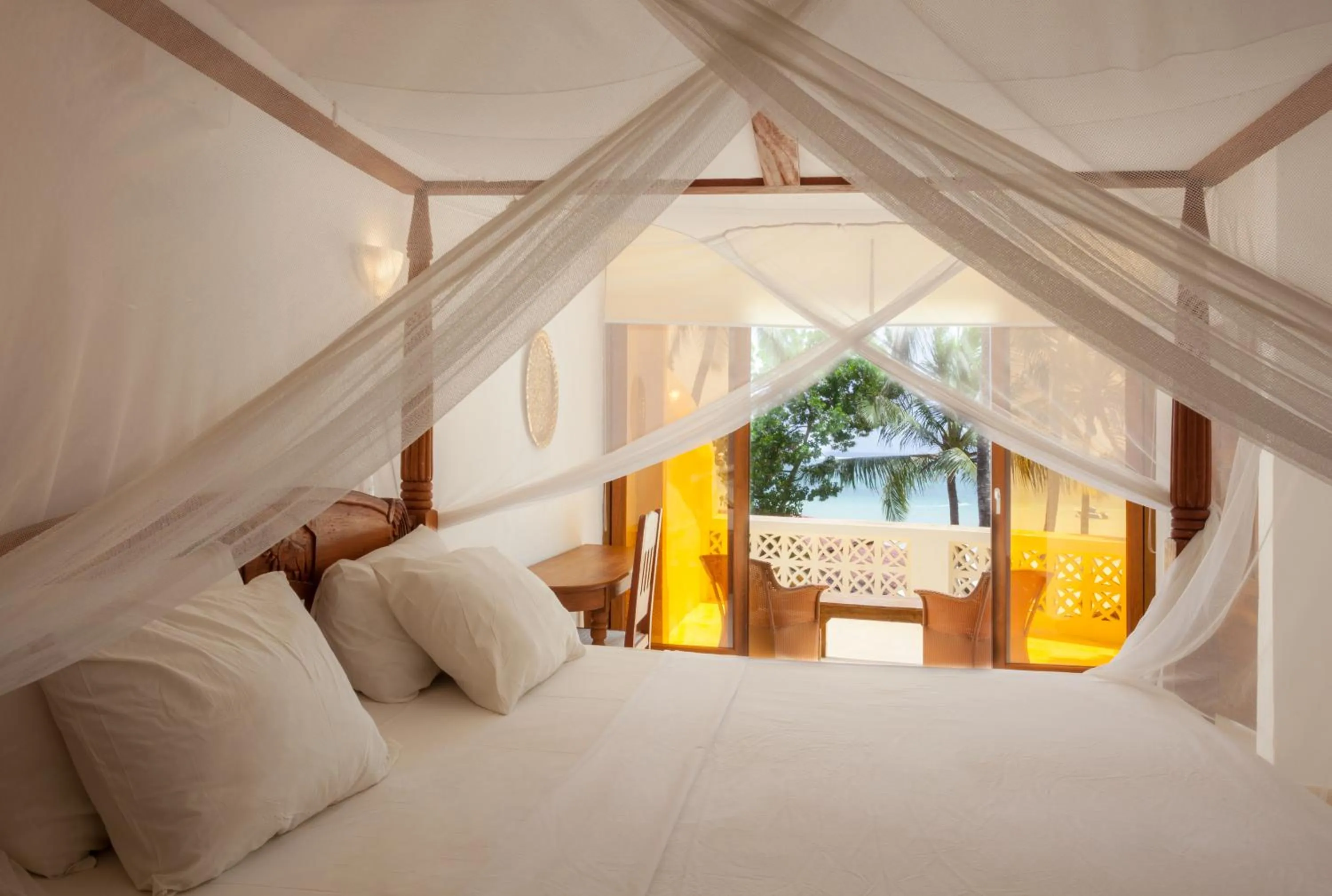 Bed in Blue Marlin Beach Hotel