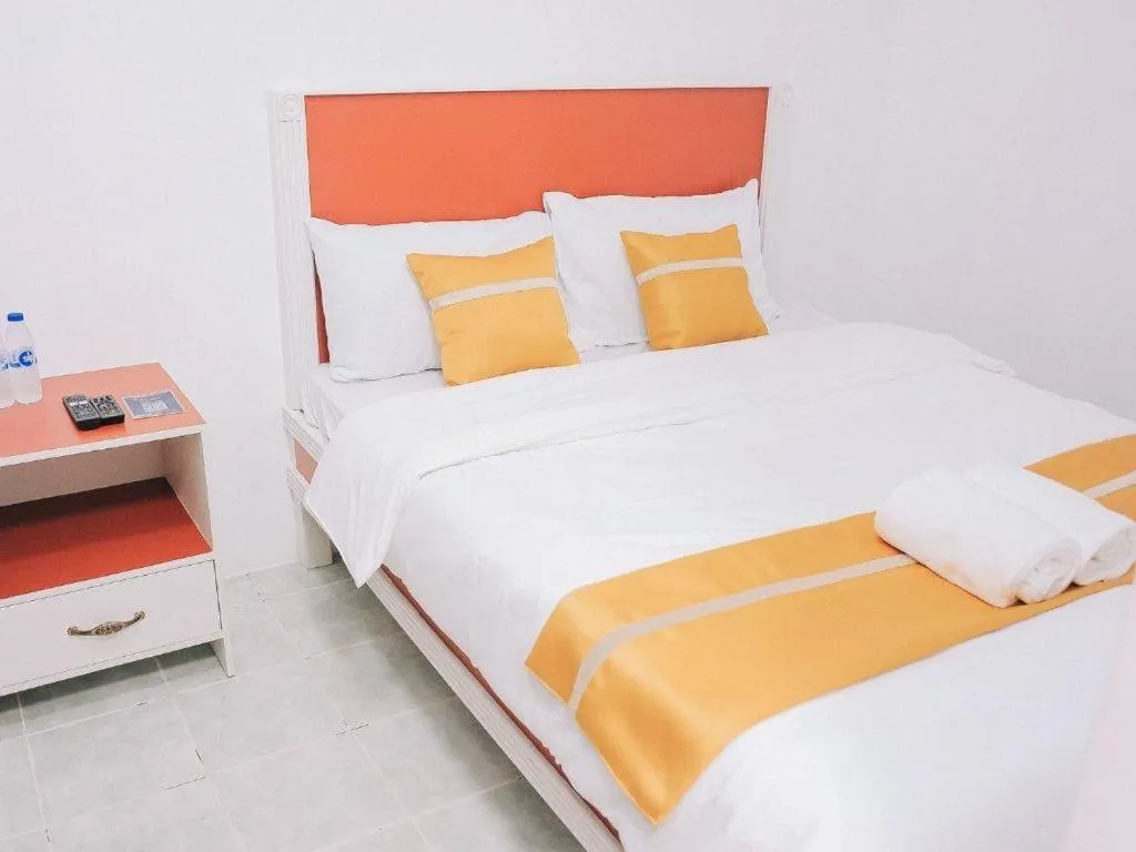 Bed in Villa Excellance Beach and Wave Pool Resort