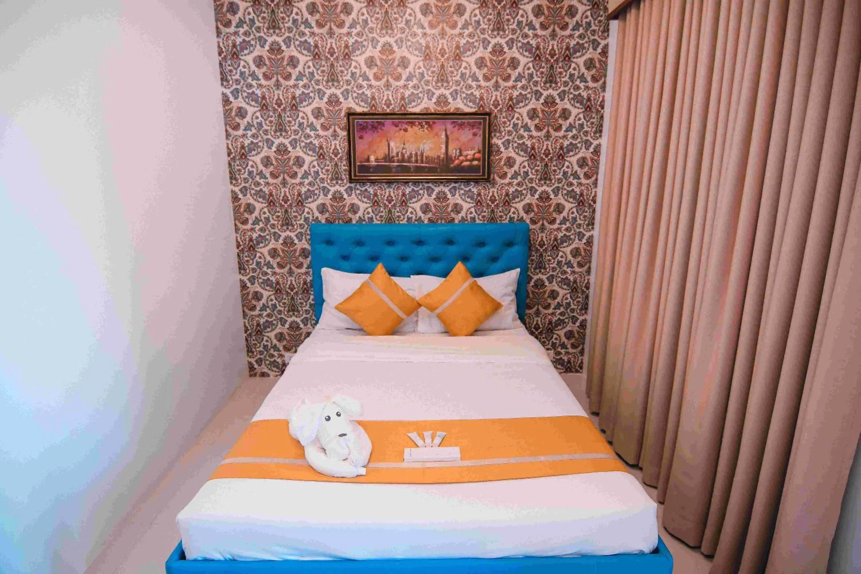 Bed in Villa Excellance Beach and Wave Pool Resort