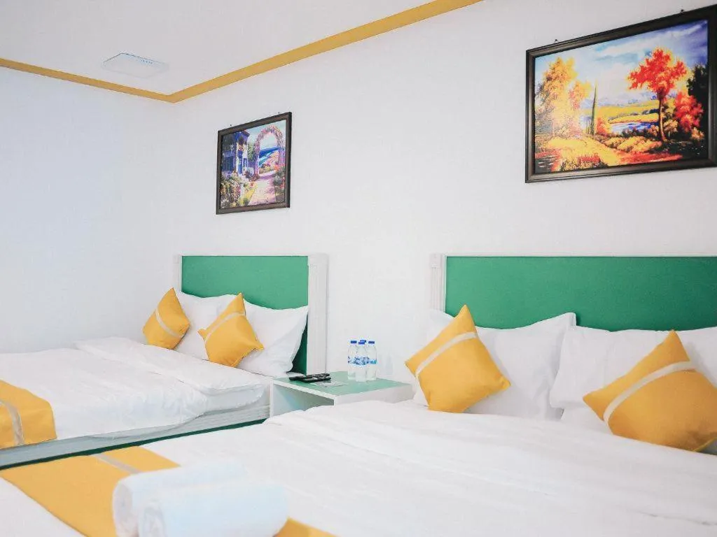 Bed in Villa Excellance Beach and Wave Pool Resort