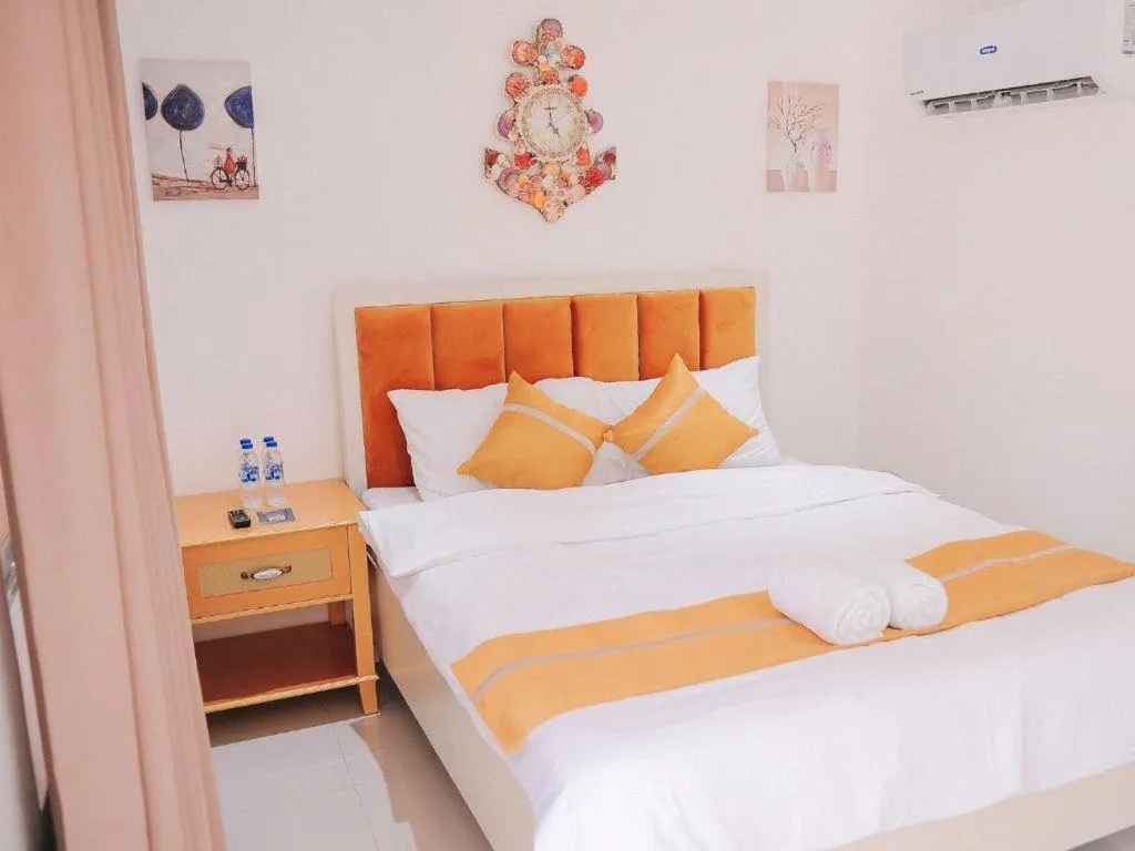 Bed in Villa Excellance Beach and Wave Pool Resort