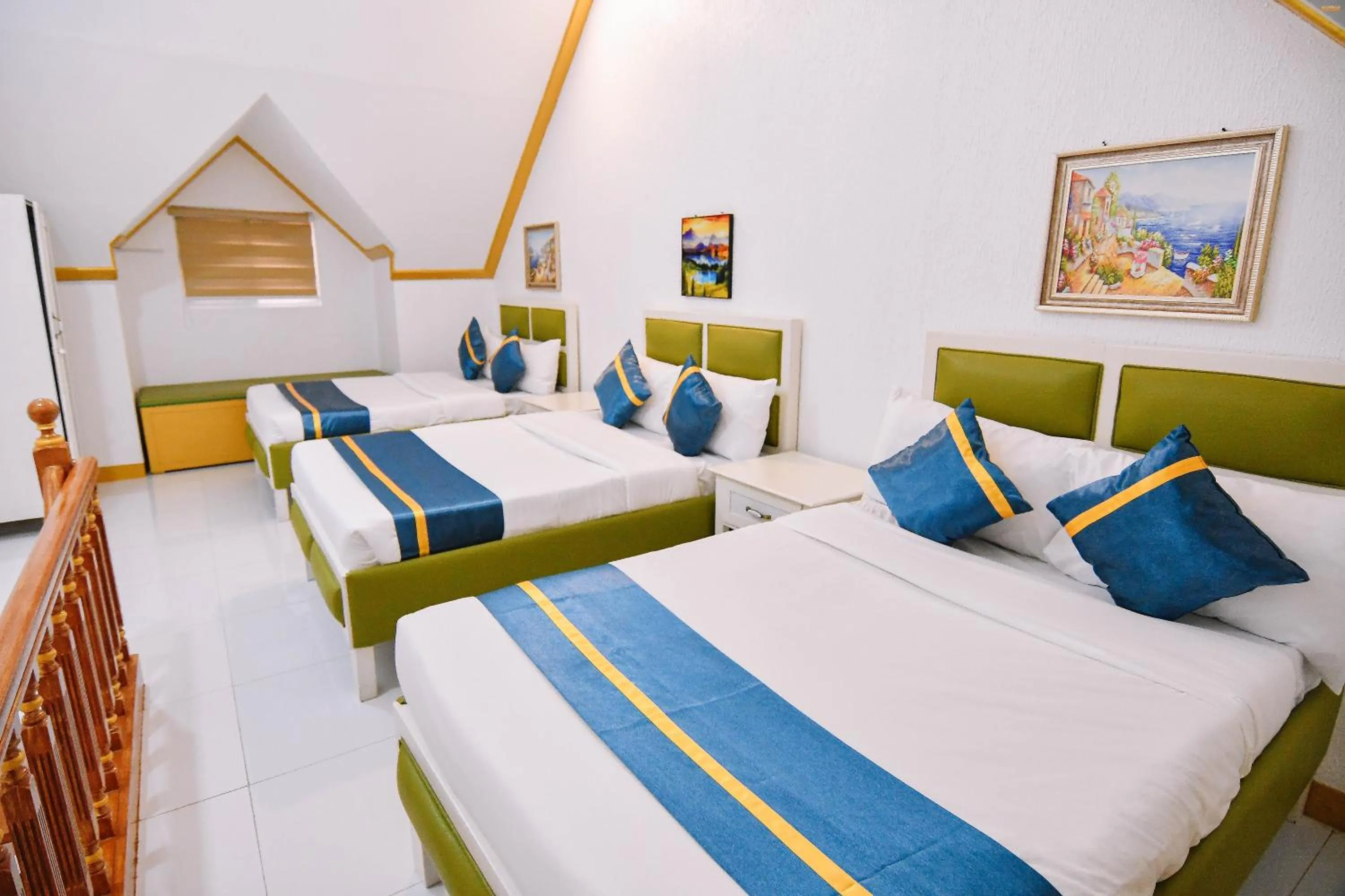 Bed in Villa Excellance Beach and Wave Pool Resort