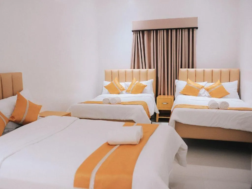 Bed in Villa Excellance Beach and Wave Pool Resort