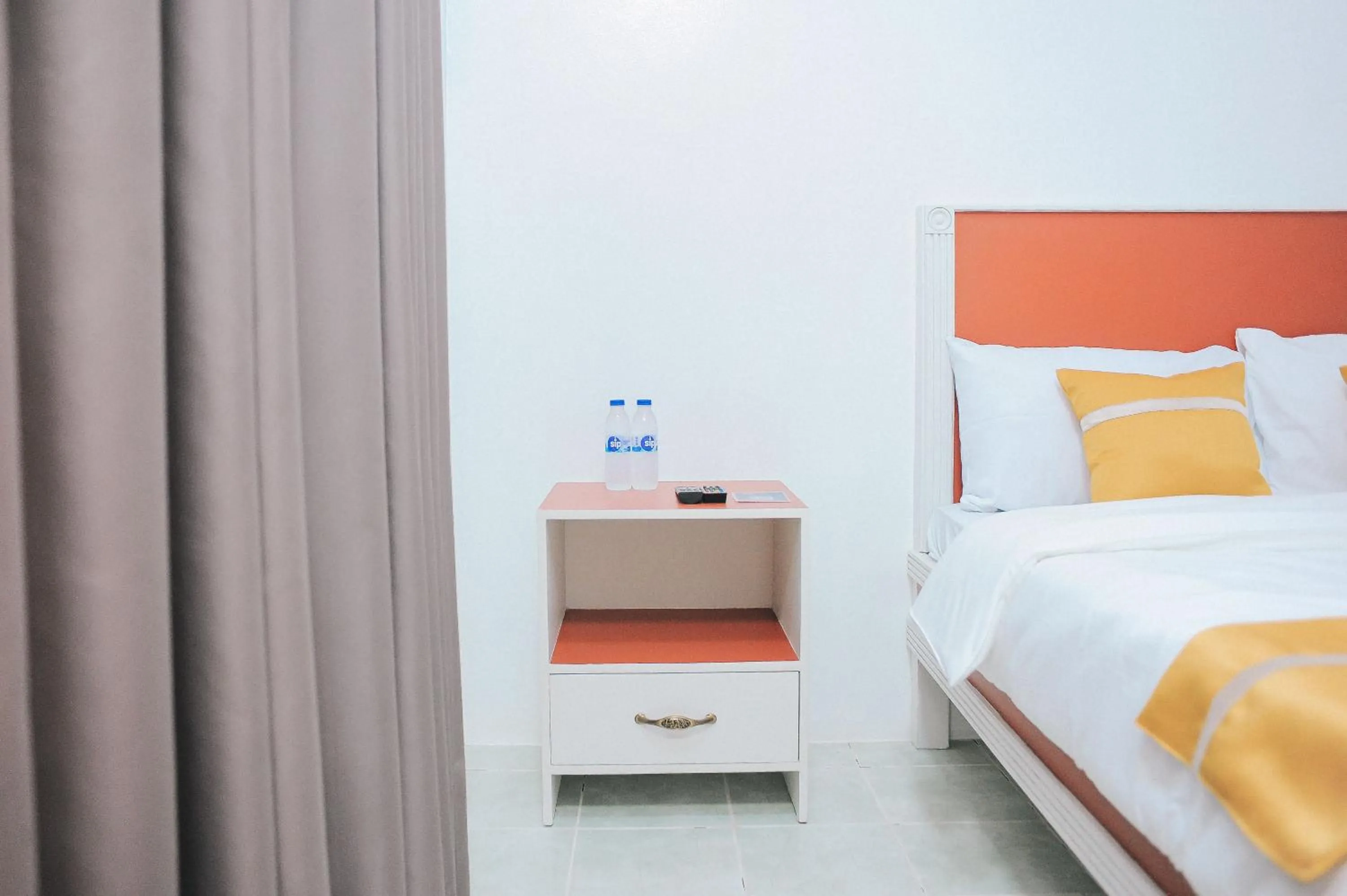 Bed in Villa Excellance Beach and Wave Pool Resort