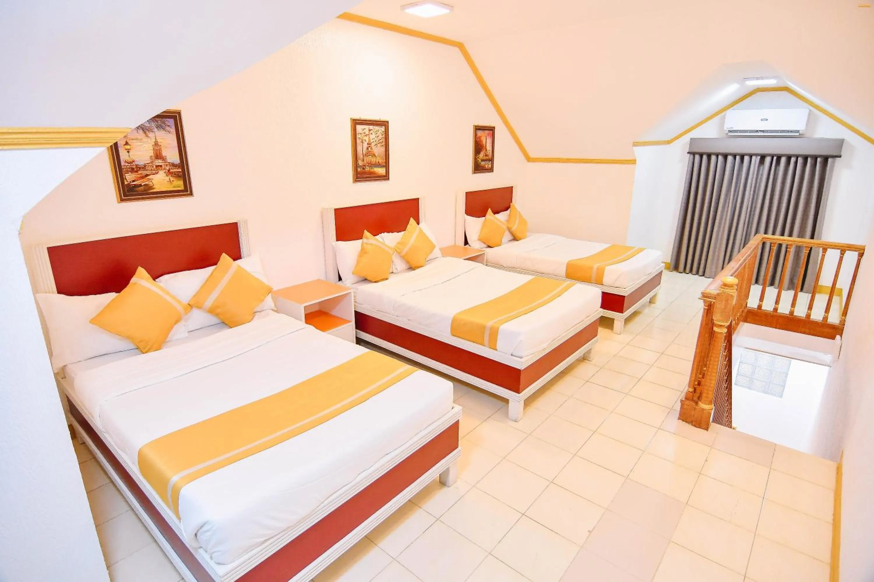 Bed in Villa Excellance Beach and Wave Pool Resort