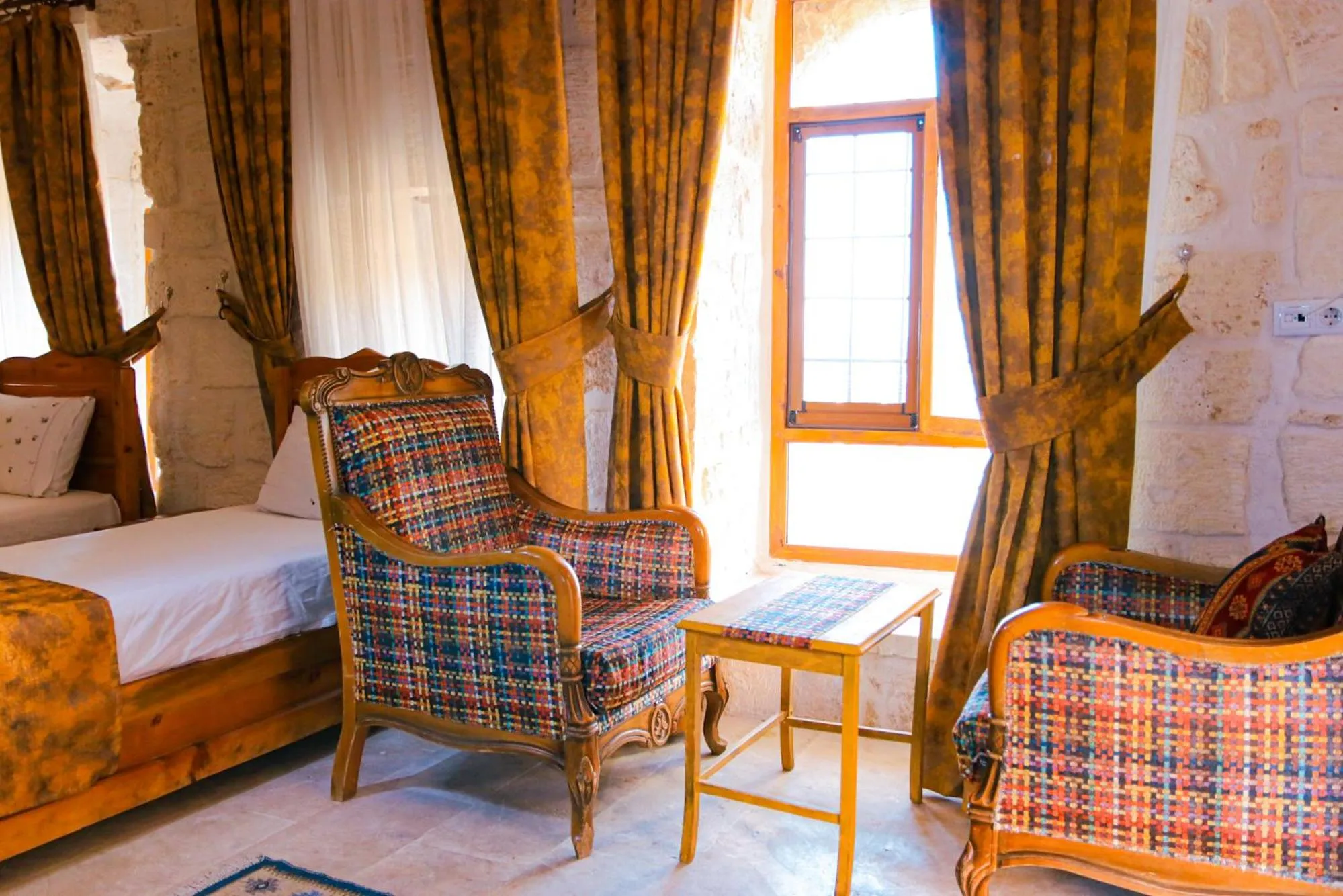 Seating area, Bed in Mons Masius Hotel Teras