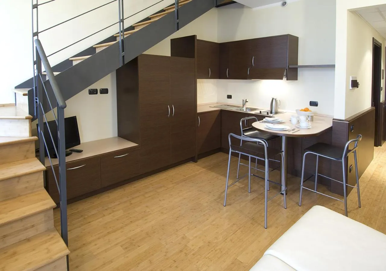 Kitchen or kitchenette in As Hotel Cambiago