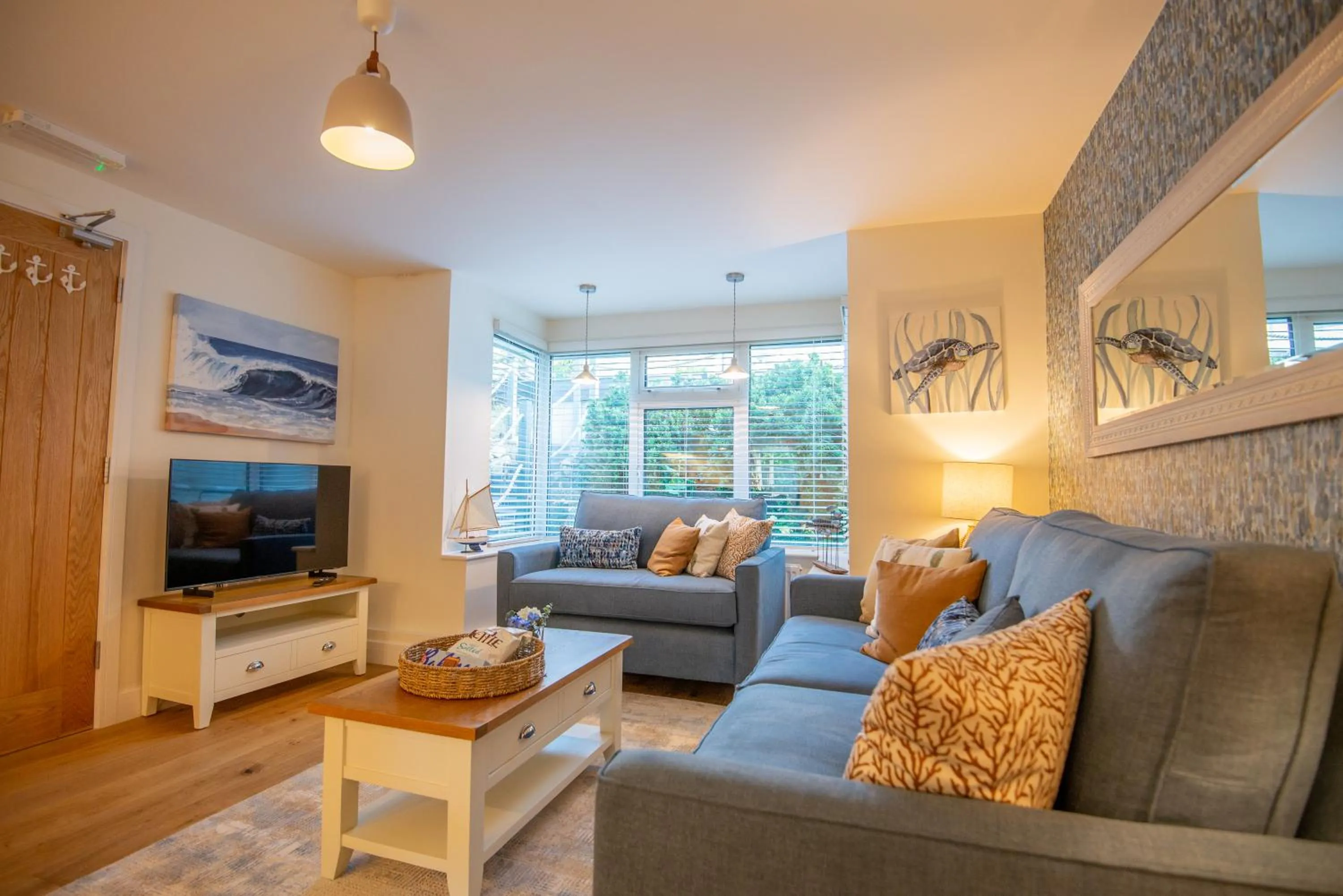 Communal lounge/ TV room in The Beach Escapes