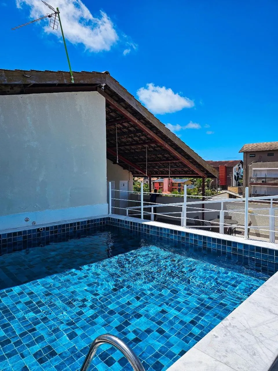 Swimming pool in Pousada Jardins Tropical