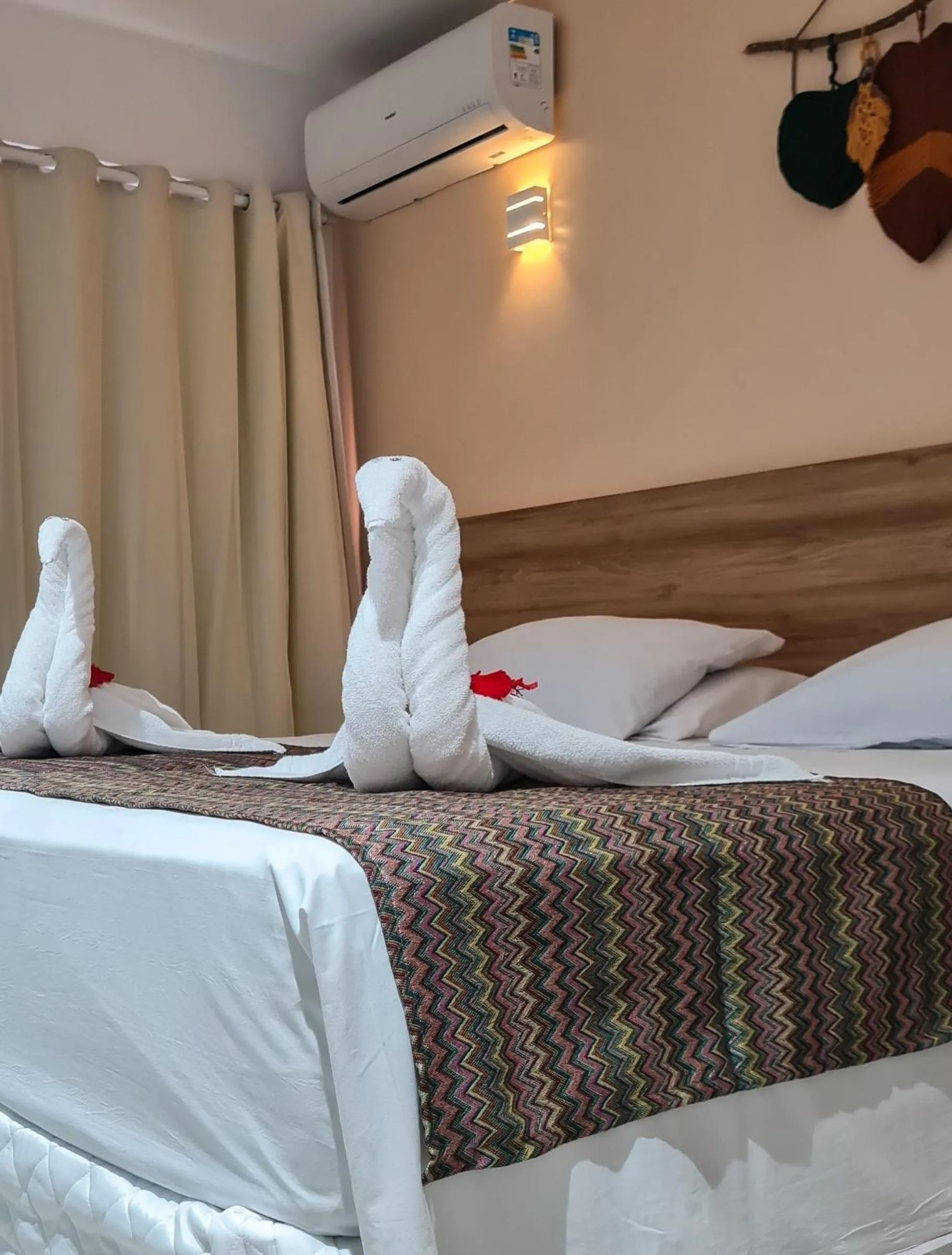 Bed in Pousada Jardins Tropical