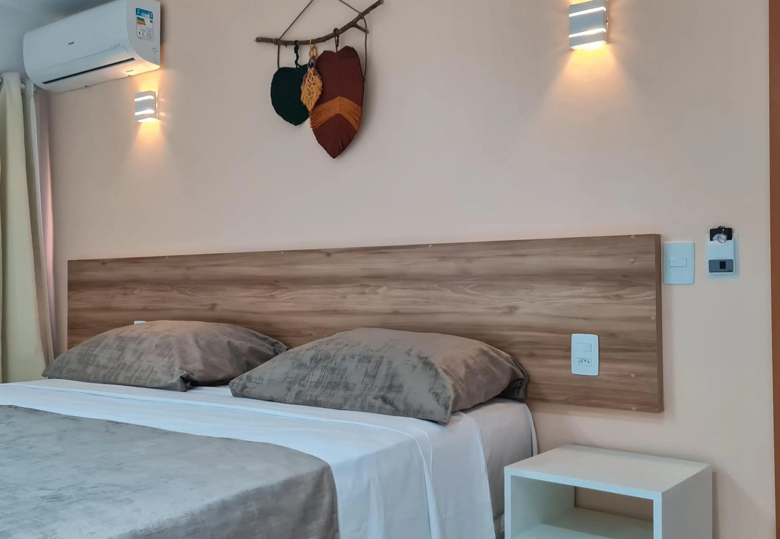 Bed in Pousada Jardins Tropical